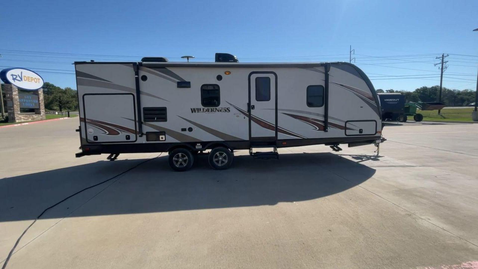 2018 HEARTLAND WILDERNESS 2450FB (5SFNB3022JN) , Length: 30.33 ft. | Dry Weight: 5,433 lbs. | Gross Weight: 6,900 lbs. | Slides: 1 transmission, located at 4319 N Main St, Cleburne, TX, 76033, (817) 678-5133, 32.385960, -97.391212 - With the 2018 Heartland Recreation Wilderness 2450FB travel trailer, set out on an outdoor adventure. For those looking for an unforgettable camping experience, this well-designed RV offers the ideal home away from home thanks to its innovative design, comfort, and functionality. The dimensions of t - Photo#2