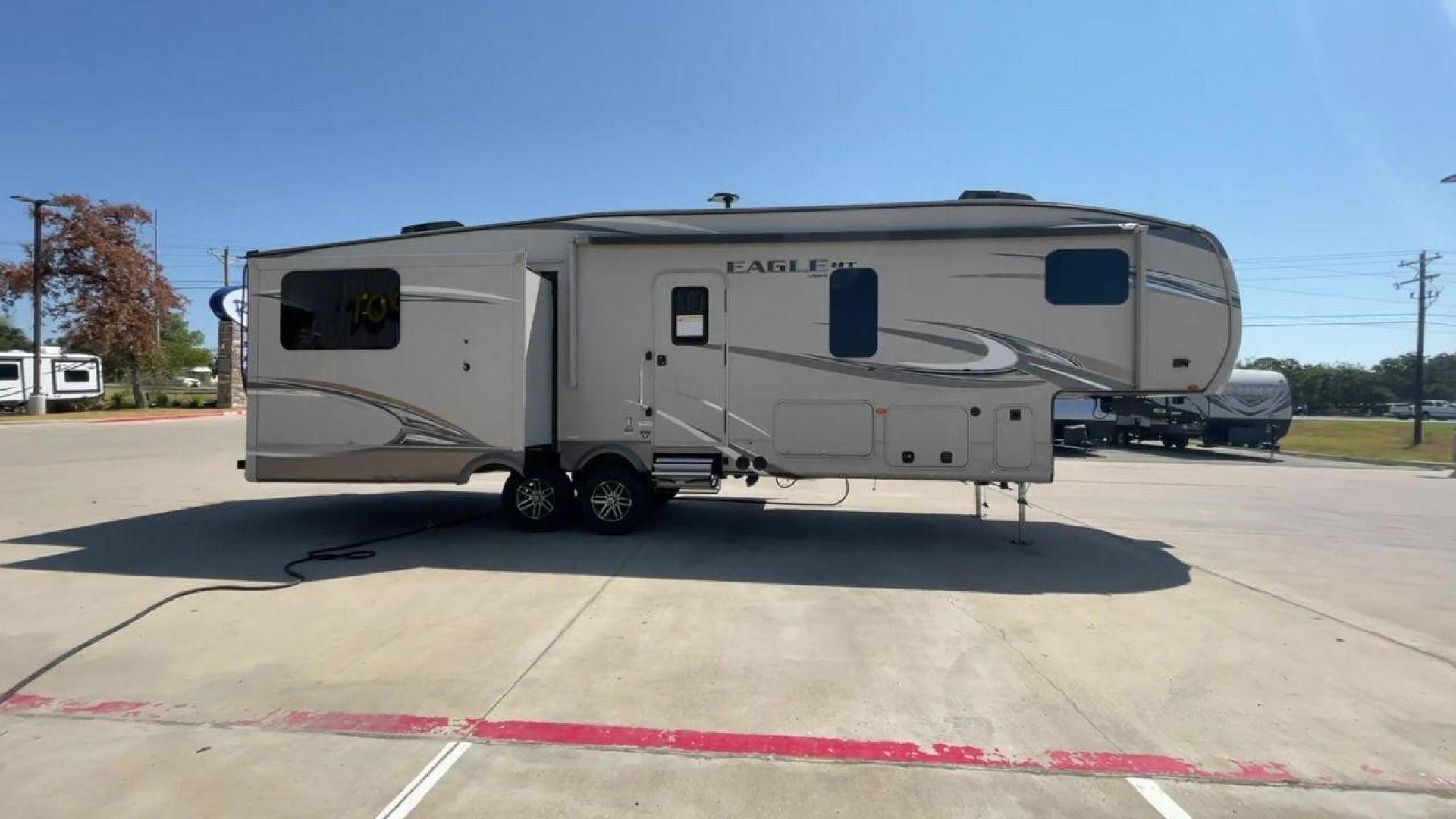 2018 JAYCO EAGLE 30.5 MBOK (1UJCJ0BT5J1) , Length: 36.7 ft.| Dry Weight: 9,670 lbs. | Gross Weight: 11,950 lbs. | Slides: 4 transmission, located at 4319 N Main St, Cleburne, TX, 76033, (817) 678-5133, 32.385960, -97.391212 - With a length of ~36 feet, the 2018 Jayco Eagle HT 30.5MBOK is an exceptional fifth-wheel model that seamlessly blends luxury, innovation, and versatility for your ultimate travel experience. Its floor plan features a masterful bunkhouse design, offering a private and cozy space for the kids or gues - Photo#2