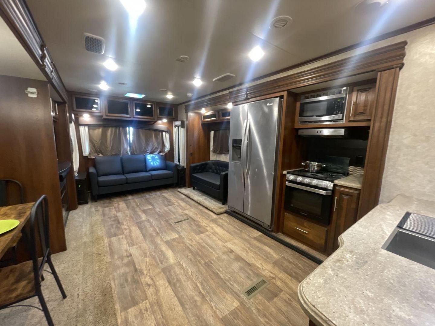 2018 WHITE JAYCO EAGLE 322RLOK (1UJBJ0BU0J1) , Length: 38.42 ft. | Dry Weight: 9,505 lbs. | Gross Weight: 11,750 lbs. | Slides: 3 transmission, located at 4319 N Main St, Cleburne, TX, 76033, (817) 678-5133, 32.385960, -97.391212 - This 2018 Eagle 322RLOK fifth wheel has a length of 38.42 ft, a width of 8 ft, and a height of 12.19 ft. Its dry weight is 9,505 lbs, with a payload capacity of 2,245 lbs. The unit's GVWR is 11,750 lbs and has a hitch weight of 1,260 lbs. The exterior extra large storage could fit your outdoor campi - Photo#12