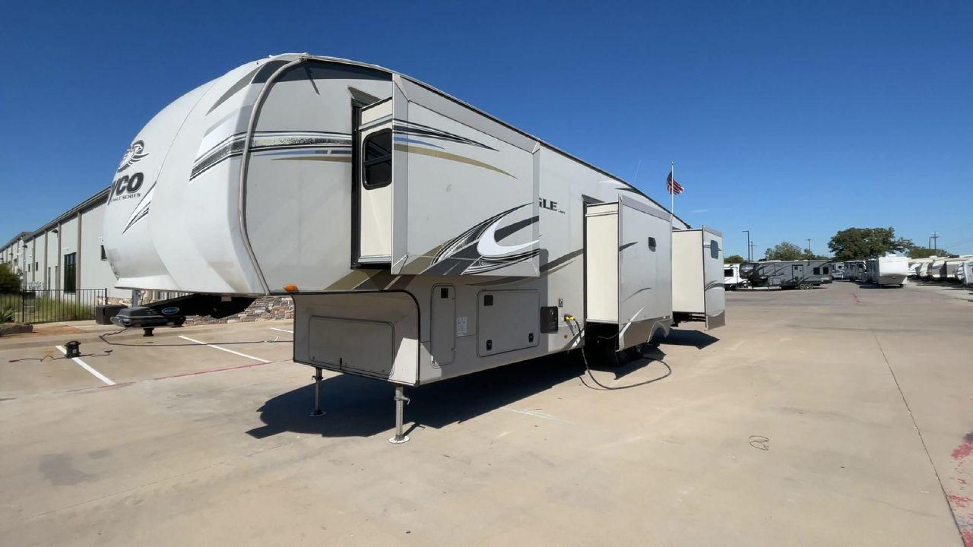 2018 TAN JAYCO EAGLE 347BHOK - (1UJCJ0BV0J1) , Length: 41.58 ft. | Dry Weight: 12,155 lbs. | Gross Weight: 14,850 lbs. | Slides: 4 transmission, located at 4319 N Main St, Cleburne, TX, 76033, (817) 678-5133, 32.385960, -97.391212 - The 2018 Jayco Eagle 347BHOK is a fifth-wheel RV that blends luxury, functionality, and family-friendly features in one impressive package. Designed for large families or groups of friends who enjoy extended camping trips or full-time RV living, this model provides a spacious layout, multiple sleepi - Photo#5