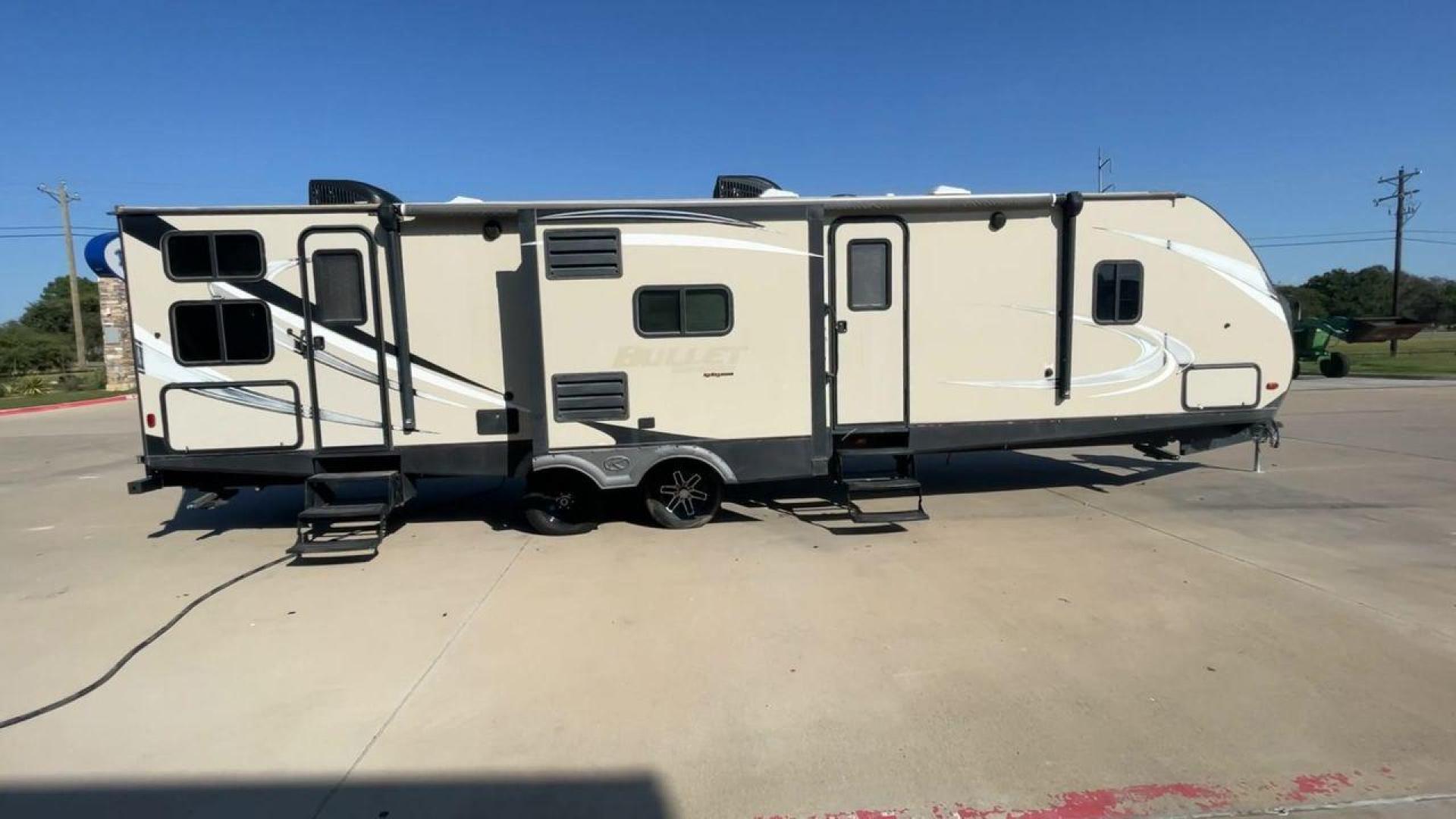 2018 KEYSTONE BULLET 330BHS (4YDT33024JT) , located at 4319 N Main St, Cleburne, TX, 76033, (817) 678-5133, 32.385960, -97.391212 - The 2018 Keystone Bullet 330BHS offers a spacious and comfortable design. Measuring 37.42 feet in length, this RV is designed for easy towing without sacrificing comfort. It boasts three slide-outs that significantly increase the living space. The exterior features a smooth fiberglass finish with sl - Photo#2