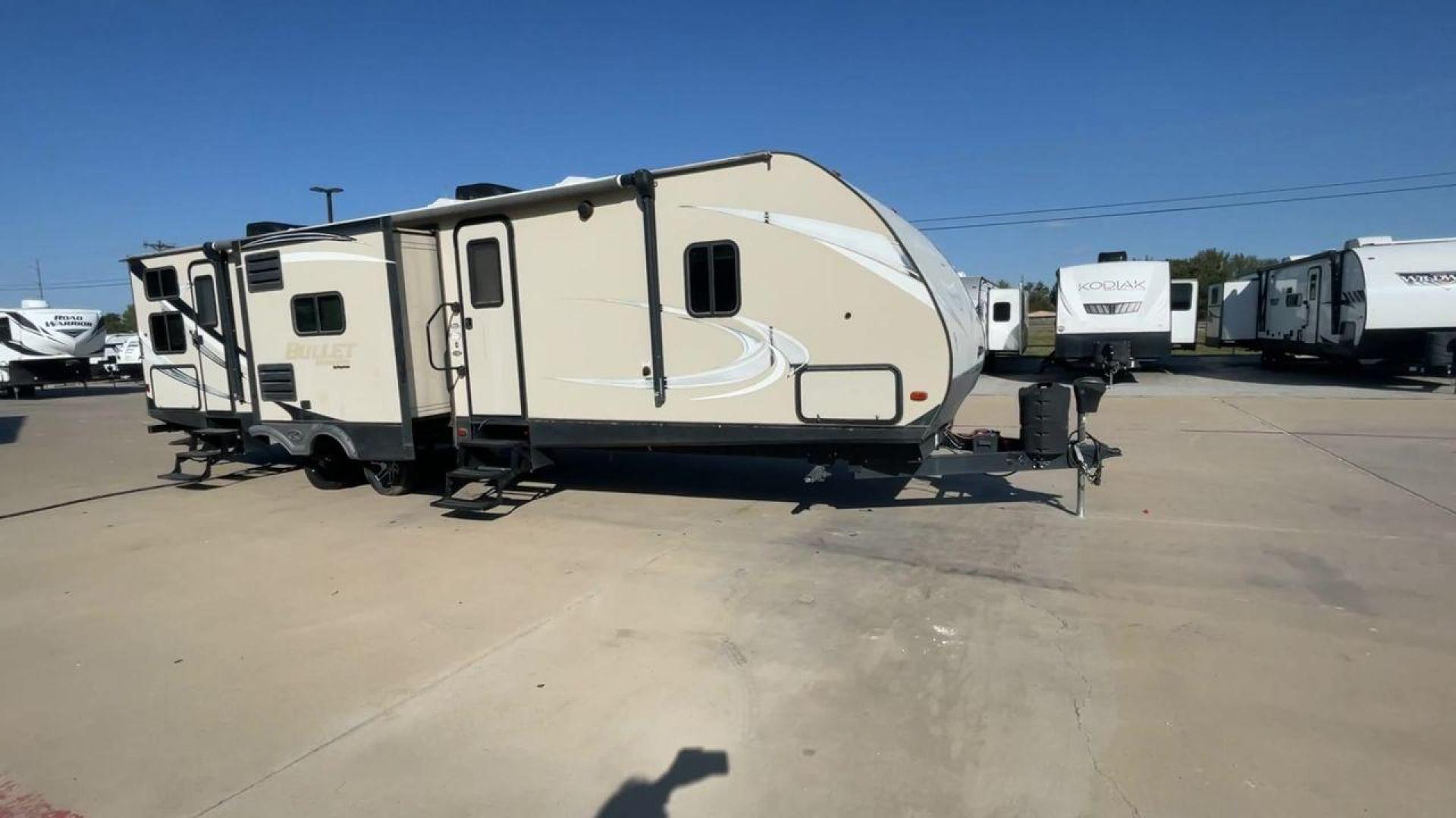 2018 KEYSTONE BULLET 330BHS (4YDT33024JT) , located at 4319 N Main St, Cleburne, TX, 76033, (817) 678-5133, 32.385960, -97.391212 - The 2018 Keystone Bullet 330BHS offers a spacious and comfortable design. Measuring 37.42 feet in length, this RV is designed for easy towing without sacrificing comfort. It boasts three slide-outs that significantly increase the living space. The exterior features a smooth fiberglass finish with sl - Photo#3