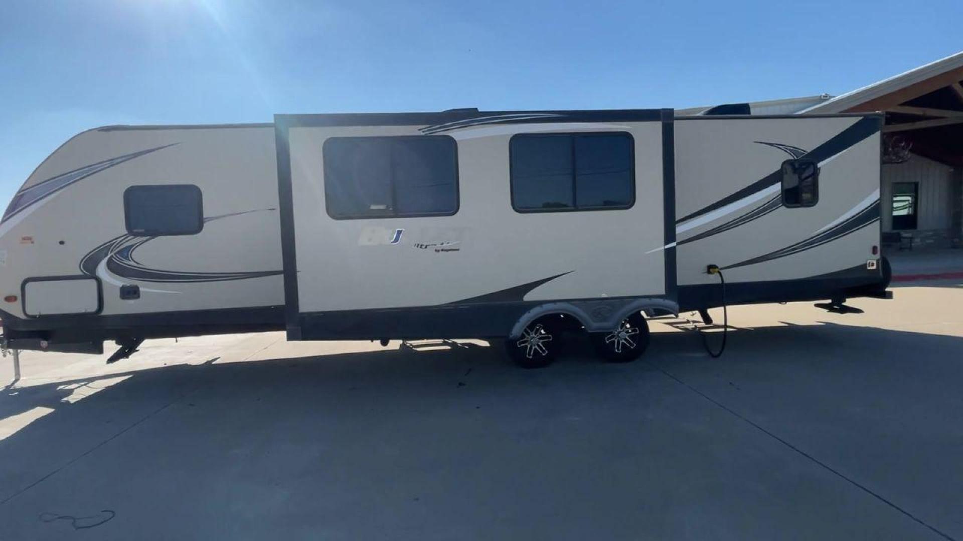 2018 KEYSTONE BULLET 330BHS (4YDT33024JT) , located at 4319 N Main St, Cleburne, TX, 76033, (817) 678-5133, 32.385960, -97.391212 - The 2018 Keystone Bullet 330BHS offers a spacious and comfortable design. Measuring 37.42 feet in length, this RV is designed for easy towing without sacrificing comfort. It boasts three slide-outs that significantly increase the living space. The exterior features a smooth fiberglass finish with sl - Photo#6