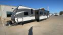 2018 SILVER KEYSTONE COLEMAN 337BH (4YDT33724JH) , Length: 37.92 ft. | Dry Weight: 8,352 lbs. | Slides: 3 transmission, located at 4319 N Main St, Cleburne, TX, 76033, (817) 678-5133, 32.385960, -97.391212 - The 2018 Keystone Coleman 337BH travel trailer is 37.92 feet long and weighs approximately 8,352 pounds (dry weight), making it a substantial yet manageable choice for extended travels or family getaways. It boasts three large slideouts that enhances the living and sleeping spaces inside. The exteri - Photo#5