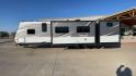 2018 SILVER KEYSTONE COLEMAN 337BH (4YDT33724JH) , Length: 37.92 ft. | Dry Weight: 8,352 lbs. | Slides: 3 transmission, located at 4319 N Main St, Cleburne, TX, 76033, (817) 678-5133, 32.385960, -97.391212 - The 2018 Keystone Coleman 337BH travel trailer is 37.92 feet long and weighs approximately 8,352 pounds (dry weight), making it a substantial yet manageable choice for extended travels or family getaways. It boasts three large slideouts that enhances the living and sleeping spaces inside. The exteri - Photo#6