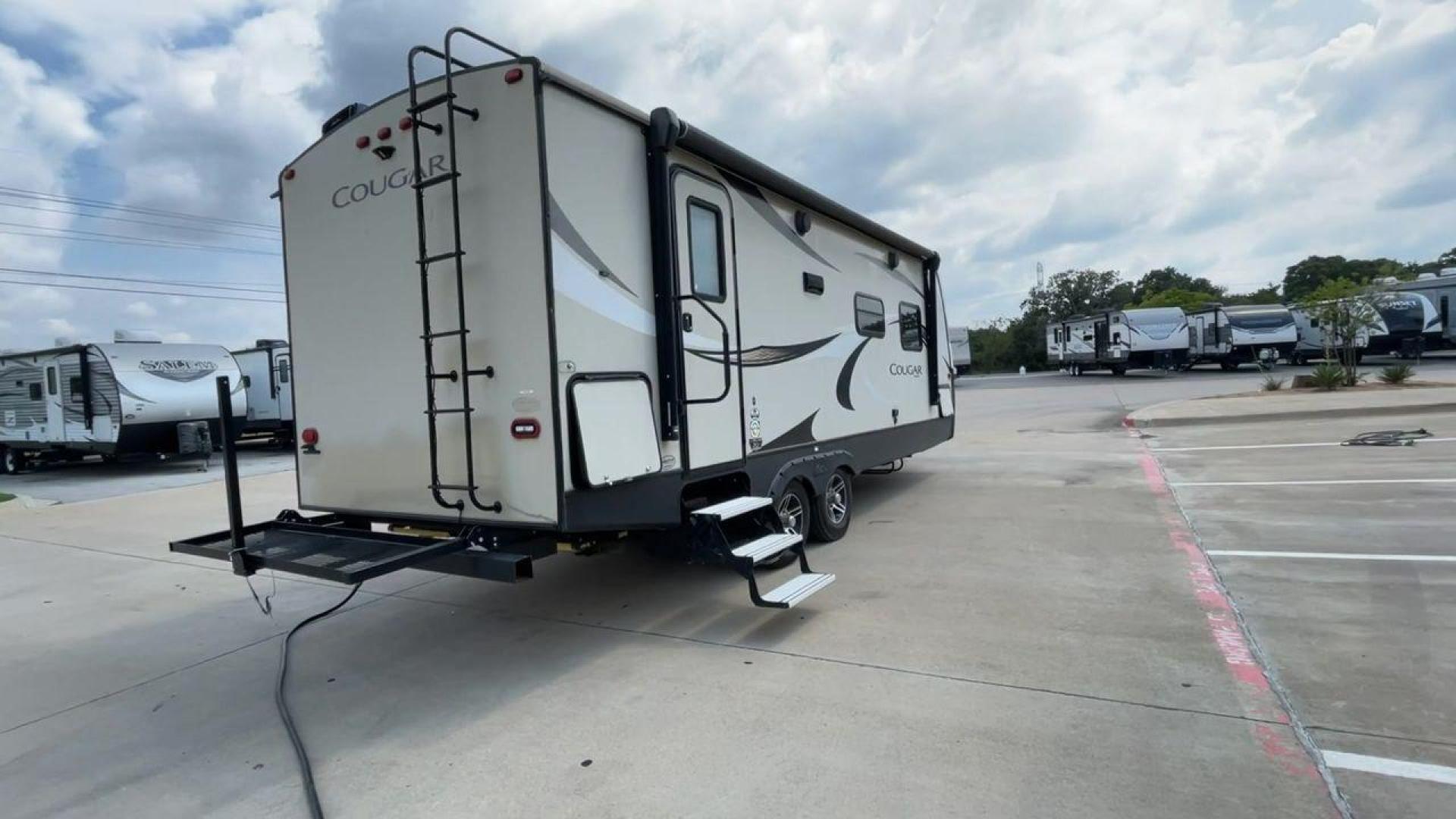 2018 WHITE KEYSTONE COUGAR 24RBS (4YDT24R29JV) , Length: 26.92 ft. | Dry Weight: 5,510 lbs. | Gross Weight: 7,500 lbs. | Slides: 1 transmission, located at 4319 N Main St, Cleburne, TX, 76033, (817) 678-5133, 32.385960, -97.391212 - The 2018 Keystone Cougar 24RBS is a well-crafted travel trailer with a length of 26.92 feet and a dry weight of 5,510 lbs, offering a spacious yet lightweight option for travelers. Its gross weight capacity of 7,500 lbs provides ample room for packing all your adventure gear. The exterior features a - Photo#1