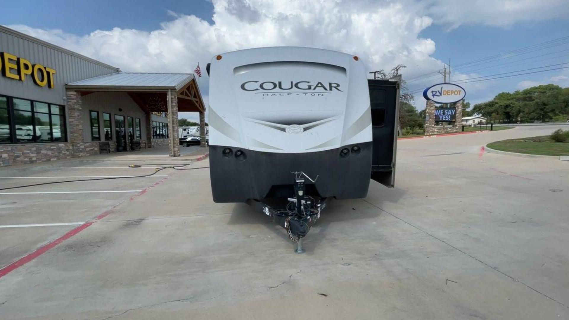 2018 WHITE KEYSTONE COUGAR 24RBS (4YDT24R29JV) , Length: 26.92 ft. | Dry Weight: 5,510 lbs. | Gross Weight: 7,500 lbs. | Slides: 1 transmission, located at 4319 N Main St, Cleburne, TX, 76033, (817) 678-5133, 32.385960, -97.391212 - The 2018 Keystone Cougar 24RBS is a well-crafted travel trailer with a length of 26.92 feet and a dry weight of 5,510 lbs, offering a spacious yet lightweight option for travelers. Its gross weight capacity of 7,500 lbs provides ample room for packing all your adventure gear. The exterior features a - Photo#4