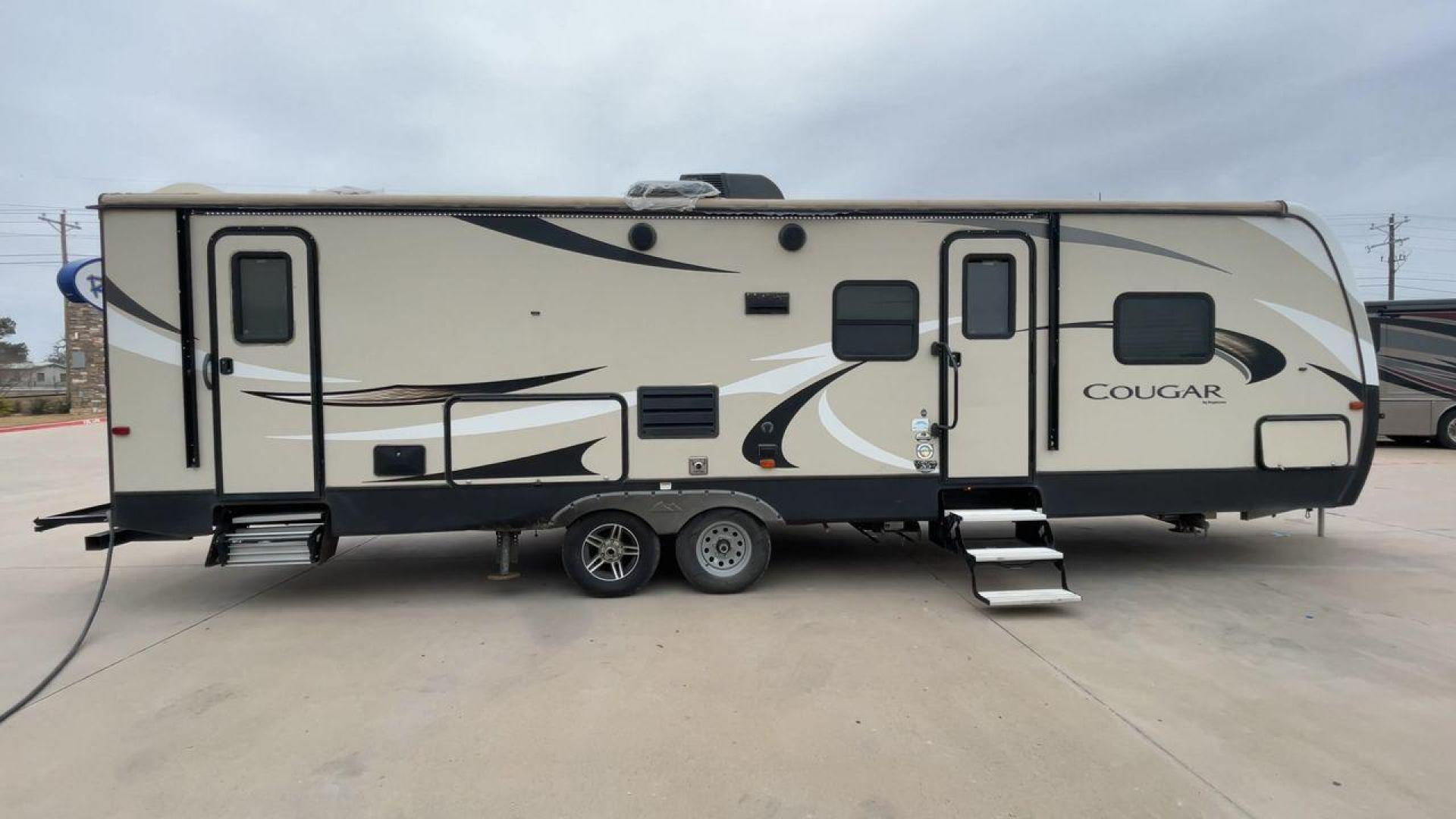 2018 WHITE KEYSTONE COUGAR 29BHS (4YDT29B29JV) , Length: 34.75 ft. | Dry Weight: 6,870 lbs. | Gross Weight: 8,800 lbs. | Slides: 1 transmission, located at 4319 N Main St, Cleburne, TX, 76033, (817) 678-5133, 32.385960, -97.391212 - The 2018 Keystone Cougar 29BHS is a single-slide travel trailer that measures just a bit under 35 ft. in length. It has a dry weight of 6,870 lbs. and a GVWR of 8,800 lbs. Its exterior is a base color of tan with white and gray accents. It comes with an automatic heating and cooling rate of 35,000 a - Photo#2