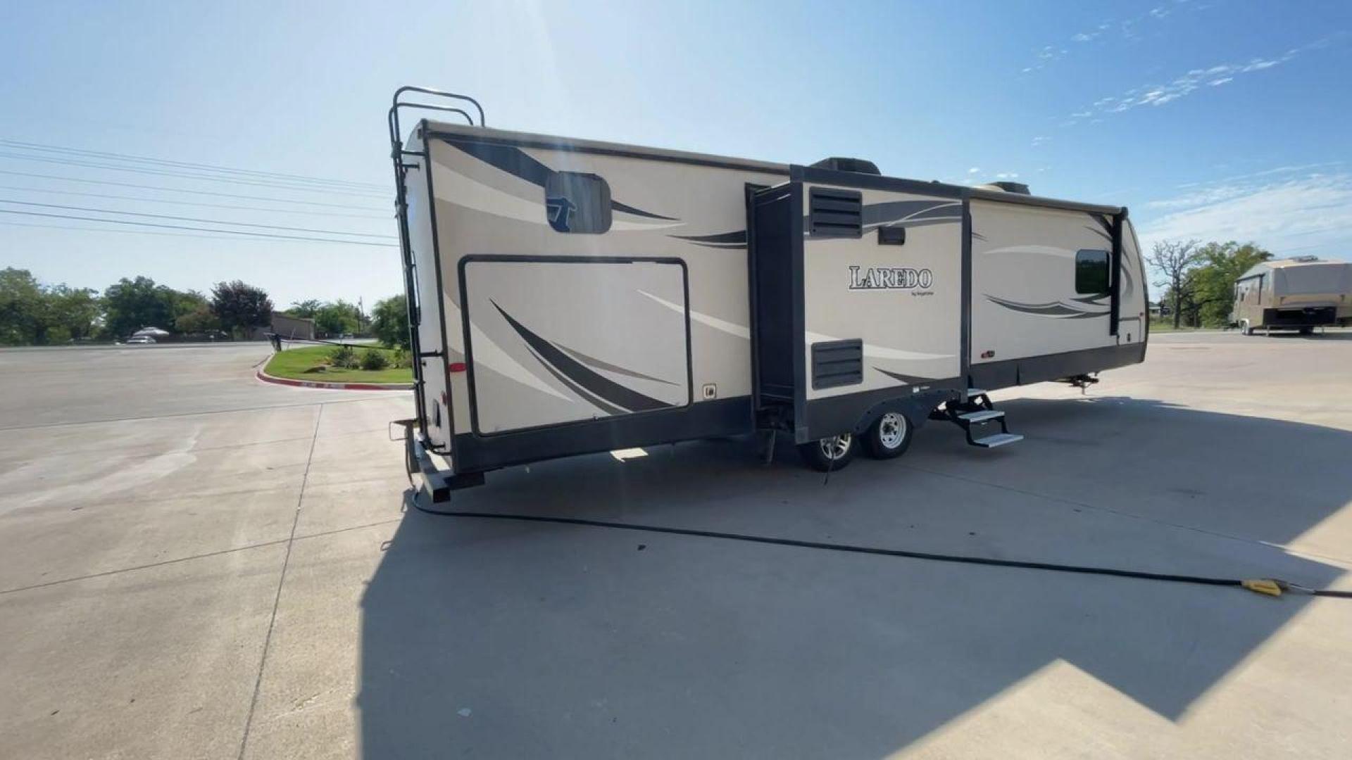 2018 KEYSTONE LAREDO 331BH (4YDT33129JV) , Length: 37.92 ft. | Dry Weight: 8,090 lbs. | Gross Weight: 9,655 lbs. 9,655 lbs. | Slides: 3 transmission, located at 4319 N Main St, Cleburne, TX, 76033, (817) 678-5133, 32.385960, -97.391212 - Photo#1