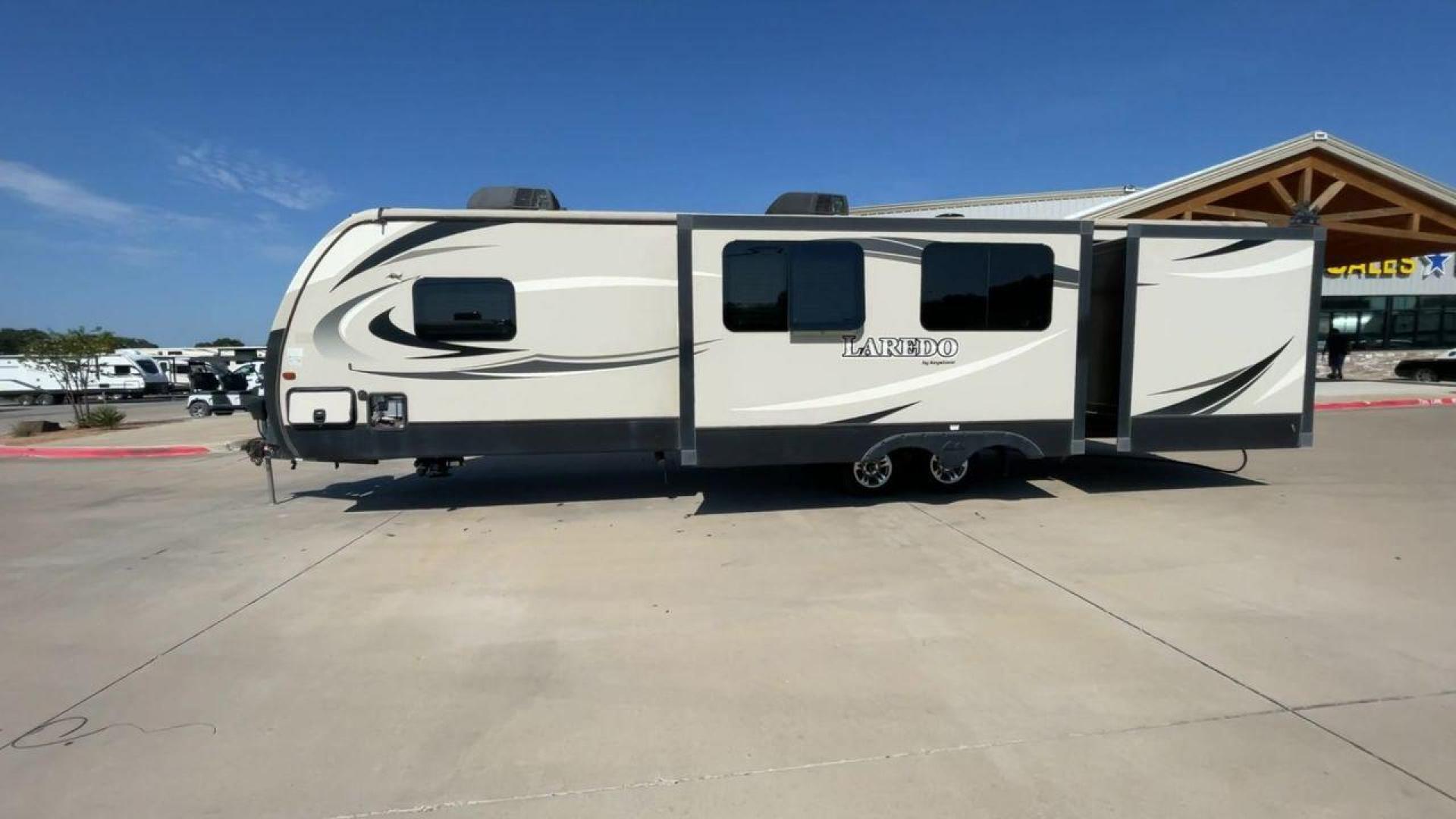 2018 KEYSTONE LAREDO 331BH (4YDT33129JV) , Length: 37.92 ft. | Dry Weight: 8,090 lbs. | Gross Weight: 9,655 lbs. 9,655 lbs. | Slides: 3 transmission, located at 4319 N Main St, Cleburne, TX, 76033, (817) 678-5133, 32.385960, -97.391212 - Photo#6