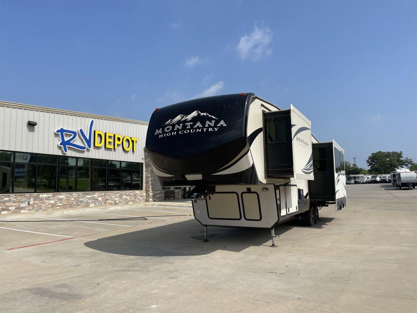 2018 TAN KEYSTONE MONTANA 305RL (4YDF3052XJA) , Length: 35.67 ft. | Dry Weight: 10,390 lbs. | Gross Weight: 14,270 lbs. | Slides: 3 transmission, located at 4319 N Main St, Cleburne, TX, 76033, (817) 678-5133, 32.385960, -97.391212 - The 2018 Keystone Montana 305RL is a dual-axle aluminum wheel set-up that measures 35.67 ft. in length. It has a dry weight of 10,390 lbs. and a GVWR of 14,270 lbs. It is made of aluminum and fiberglass. It comes with automatic heating and cooling rated at 35,000 and 15,000 BTUs respectively. With 3 - Photo#0