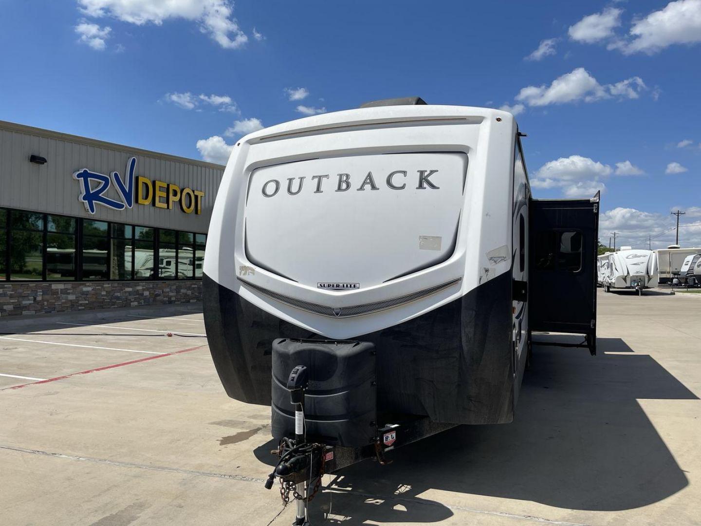 2018 BLACK KEYSTONE RV OUTBACK 325BH (4YDT32520JB) , Length: 37.42 ft. | Dry Weight: 8,428 lbs. | Gross Weight: 10,500 lbs. | Slides: 3 transmission, located at 4319 N Main St, Cleburne, TX, 76033, (817) 678-5133, 32.385960, -97.391212 - With the 2018 Keystone RV Outback 325BH Travel Trailer, unleash your spirit of adventure. Designed to provide families or groups with a roomy and cozy home on wheels, this travel trailer blends contemporary conveniences with tough durability to create a remarkable travel experience. The dimension - Photo#0