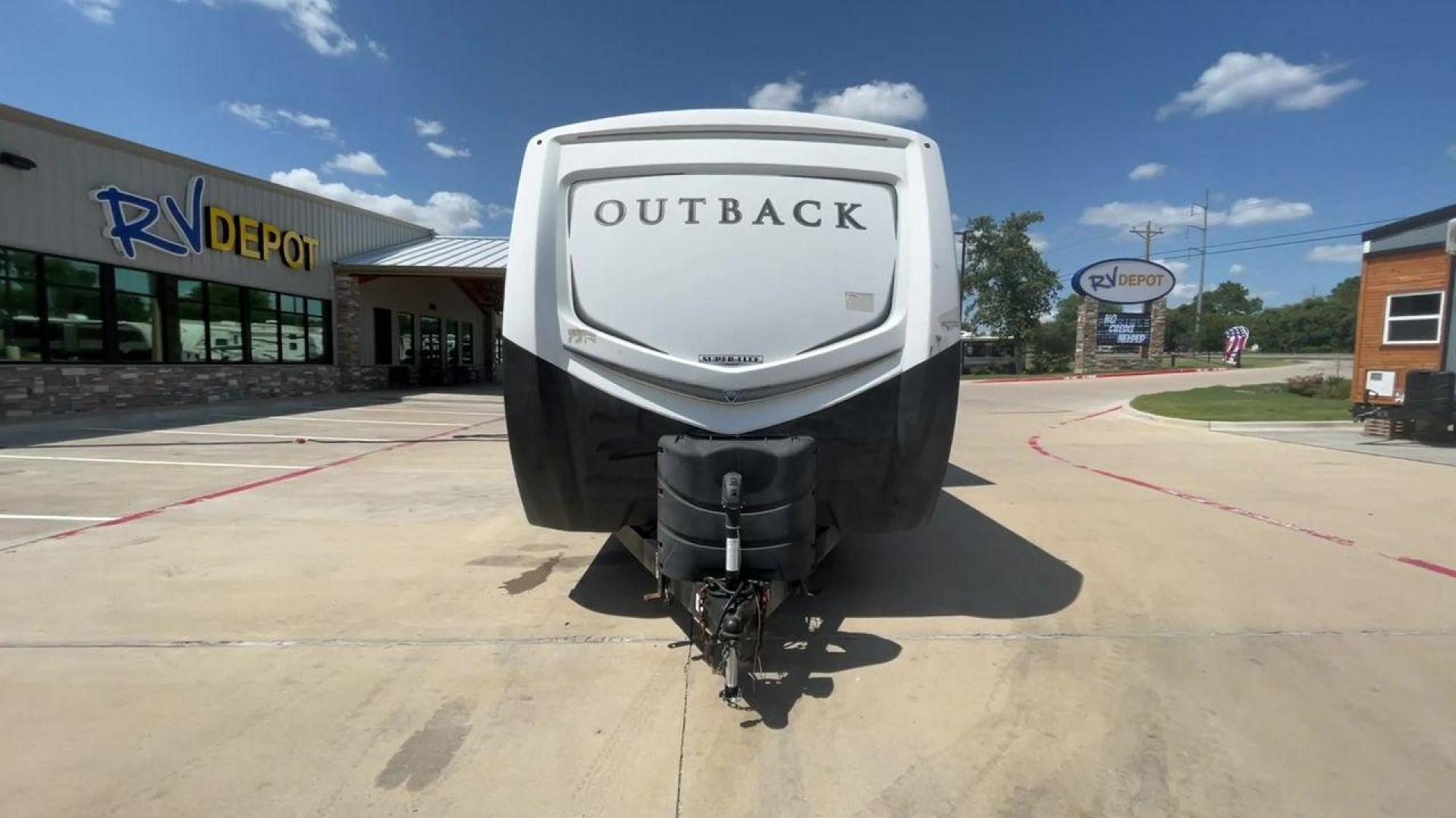 2018 BLACK KEYSTONE RV OUTBACK 325BH (4YDT32520JB) , Length: 37.42 ft. | Dry Weight: 8,428 lbs. | Gross Weight: 10,500 lbs. | Slides: 3 transmission, located at 4319 N Main St, Cleburne, TX, 76033, (817) 678-5133, 32.385960, -97.391212 - With the 2018 Keystone RV Outback 325BH Travel Trailer, unleash your spirit of adventure. Designed to provide families or groups with a roomy and cozy home on wheels, this travel trailer blends contemporary conveniences with tough durability to create a remarkable travel experience. The dimension - Photo#4