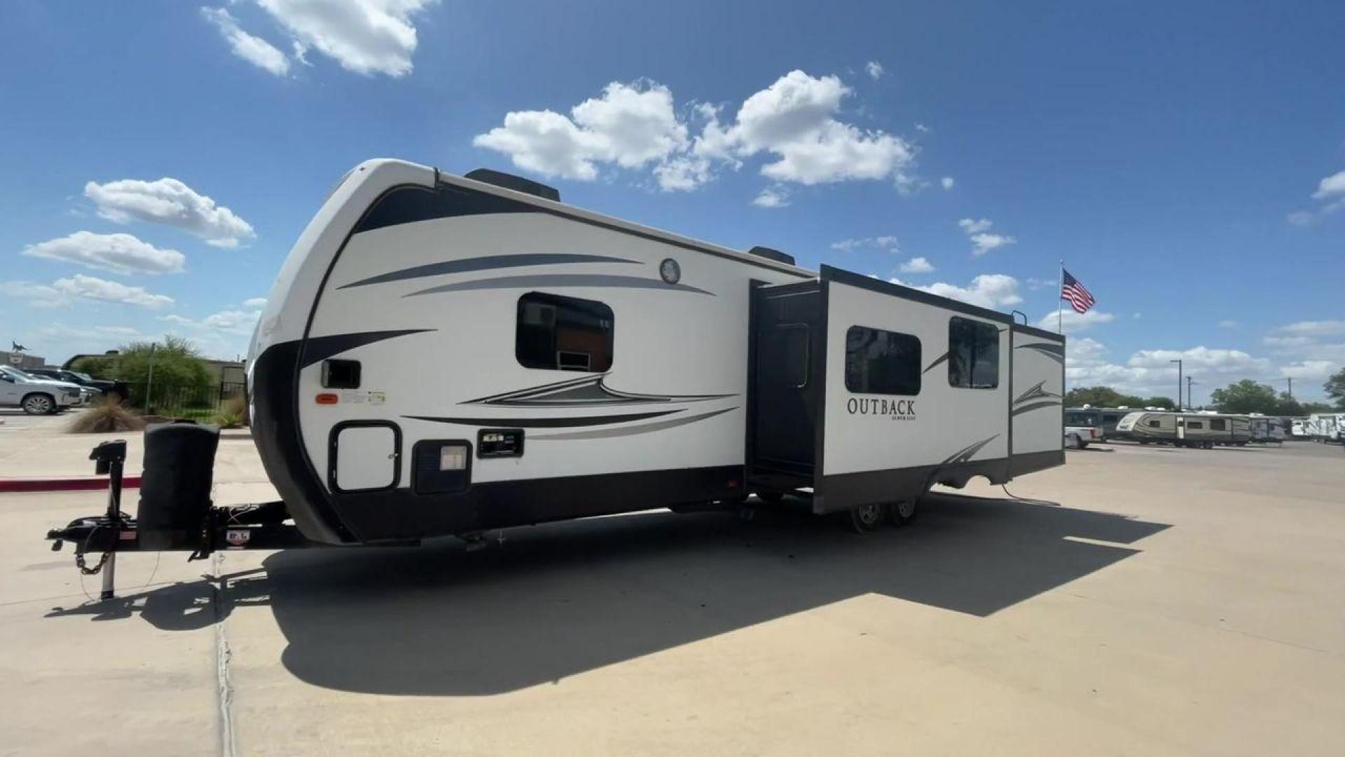 2018 BLACK KEYSTONE RV OUTBACK 325BH (4YDT32520JB) , Length: 37.42 ft. | Dry Weight: 8,428 lbs. | Gross Weight: 10,500 lbs. | Slides: 3 transmission, located at 4319 N Main St, Cleburne, TX, 76033, (817) 678-5133, 32.385960, -97.391212 - With the 2018 Keystone RV Outback 325BH Travel Trailer, unleash your spirit of adventure. Designed to provide families or groups with a roomy and cozy home on wheels, this travel trailer blends contemporary conveniences with tough durability to create a remarkable travel experience. The dimension - Photo#5