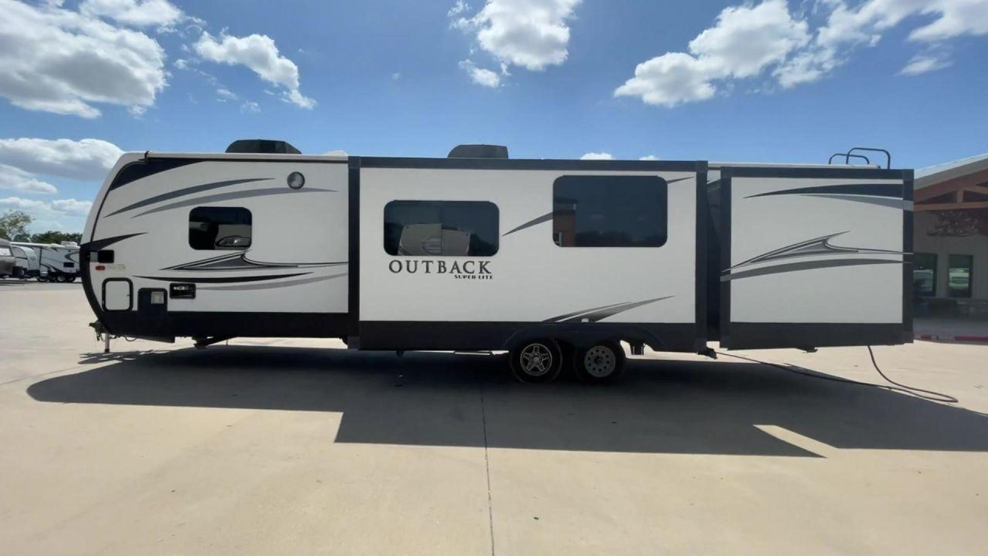 2018 BLACK KEYSTONE RV OUTBACK 325BH (4YDT32520JB) , Length: 37.42 ft. | Dry Weight: 8,428 lbs. | Gross Weight: 10,500 lbs. | Slides: 3 transmission, located at 4319 N Main St, Cleburne, TX, 76033, (817) 678-5133, 32.385960, -97.391212 - With the 2018 Keystone RV Outback 325BH Travel Trailer, unleash your spirit of adventure. Designed to provide families or groups with a roomy and cozy home on wheels, this travel trailer blends contemporary conveniences with tough durability to create a remarkable travel experience. The dimension - Photo#6