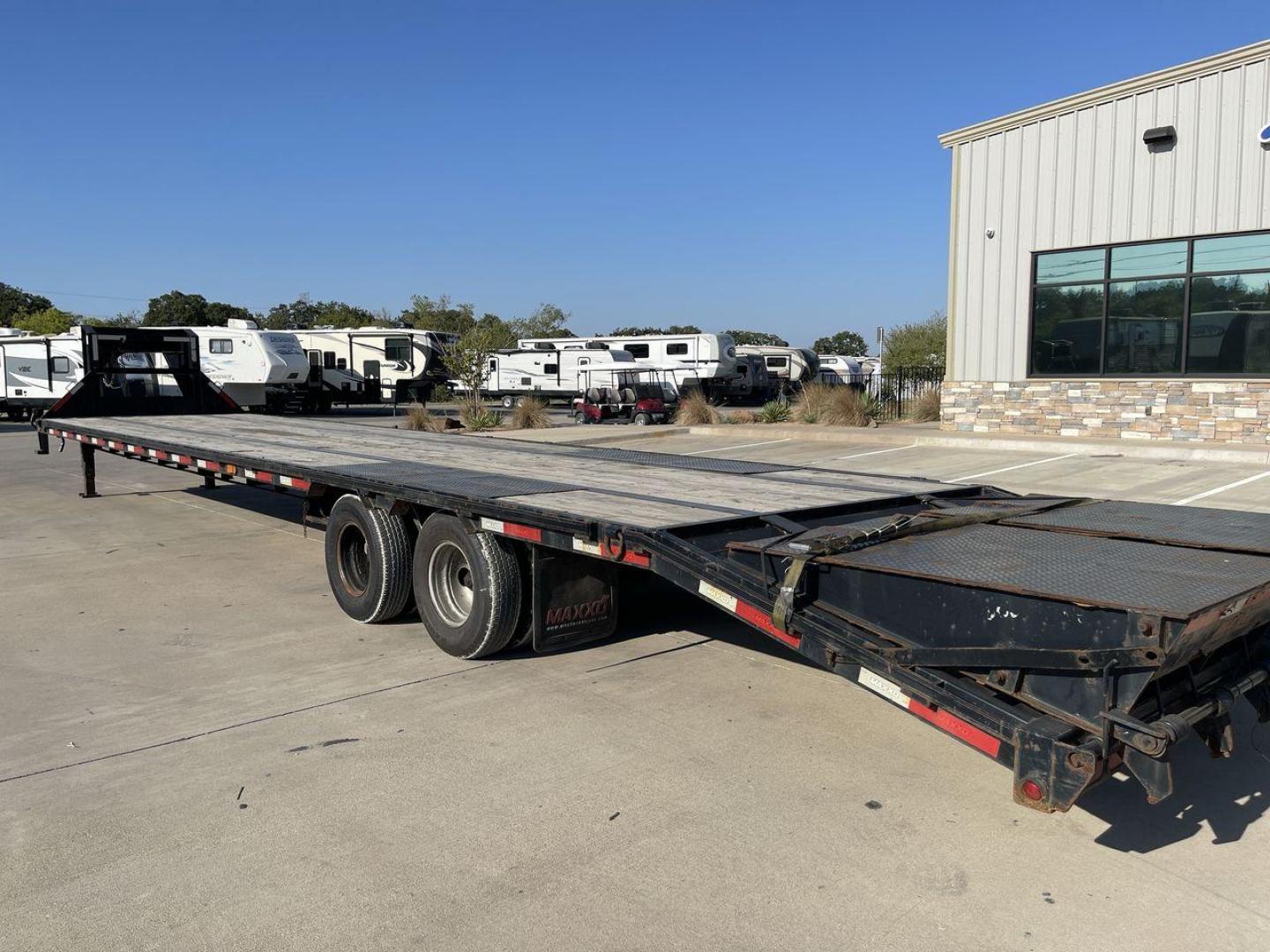 2018 BLACK MAXEY TRAILERS LDX 40 - (5R8GF4027JM) , located at 4319 N Main St, Cleburne, TX, 76033, (817) 678-5133, 32.385960, -97.391212 - The 2018 Maxey Trailers LDX40 is a top-notch utility trailer that excels in handling a diverse array of hauling tasks. This trailer is perfect for effortlessly transporting equipment, materials, and cargo, thanks to its sturdy construction and adaptable design. The LDX40 is a spacious option, measur - Photo#14