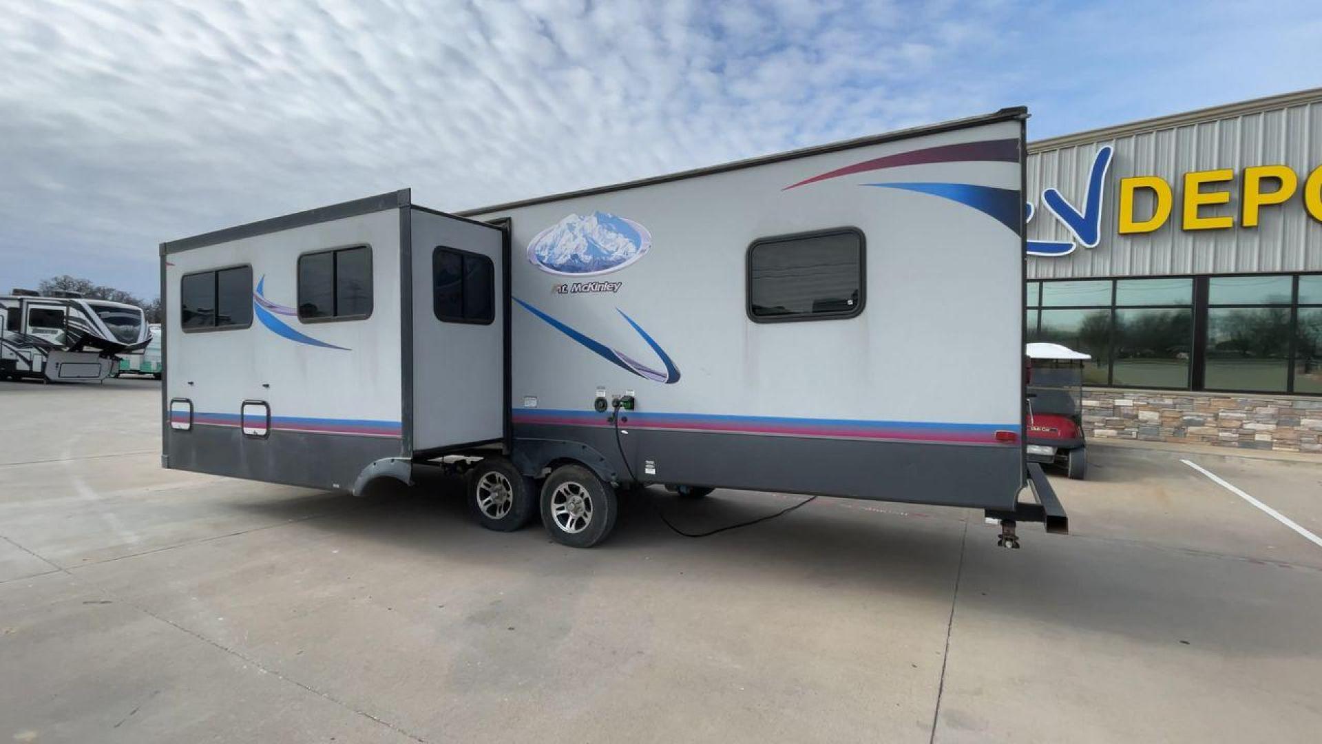 2018 GRAY RIVERSIDE MT MCKINLEY 830FK - (59CCC3223JL) , Length: 32 ft | Dry Weight: 5660 lbs | Slides: 1 transmission, located at 4319 N Main St, Cleburne, TX, 76033, (817) 678-5133, 32.385960, -97.391212 - With so much floor space to spare, the Riverside RV 830FK Mt. McKinley single slide travel trailer is the perfect way to start your next camping trip. This unit measures 32 ft in length, 8 ft in width, and 10.5 ft in height. It has a dry weight of 5,660 lbs., with a cargo capacity of 1,975 lbs., - Photo#7