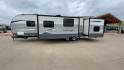 2018 TRAILMASTER 321TBS - (1NL1G372XJ1) , Length: 35.67 ft. | Dry Weight: 7,506 lbs. | Slides: 2 transmission, located at 4319 N Main St, Cleburne, TX, 76033, (817) 678-5133, 32.385960, -97.391212 - The 2018 Trailmaster 321TBS Travel Trailer is a family-friendly RV designed to provide comfort and convenience for all your camping adventures. Measuring 35.67 ft. in length, 8 ft. in width, and 10.75 ft. in height, this travel trailer offers a spacious interior with thoughtful features. It has a dr - Photo#6