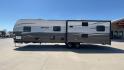 2019 TAN FOREST RIVER AVENGER 32DEN (5ZT2AVXB6KB) , Length: 37.92 ft. | Dry Weight: 7,989 lbs. | Slides: 2 transmission, located at 4319 N Main St, Cleburne, TX, 76033, (817) 678-5133, 32.385960, -97.391212 - Measuring an impressive 36 feet, this model unfolds to reveal two strategically placed slide-outs, creating a spacious haven for relaxation. The master bedroom welcomes you with a queen-size bed and ample storage, ensuring a peaceful retreat after a day of outdoor exploration. The living area is a h - Photo#6