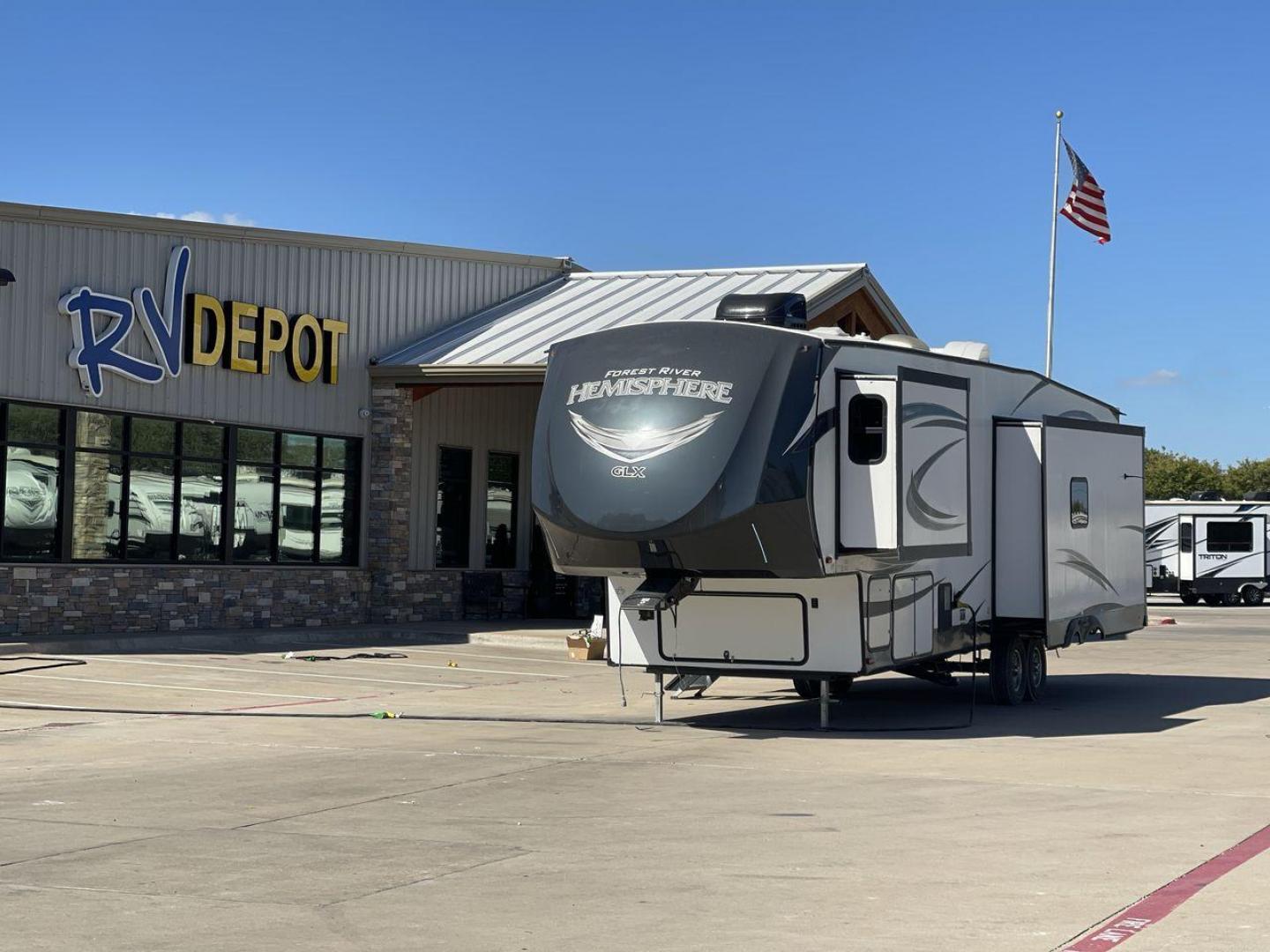 2019 FOREST RIVER HEMISPHERE 337BAR (4X4FSBK25KV) , Length: 38.5 ft. | Dry Weight: 10,264 lbs. | Slides: 3 transmission, located at 4319 N Main St, Cleburne, TX, 76033, (817) 678-5133, 32.385960, -97.391212 - Photo#0