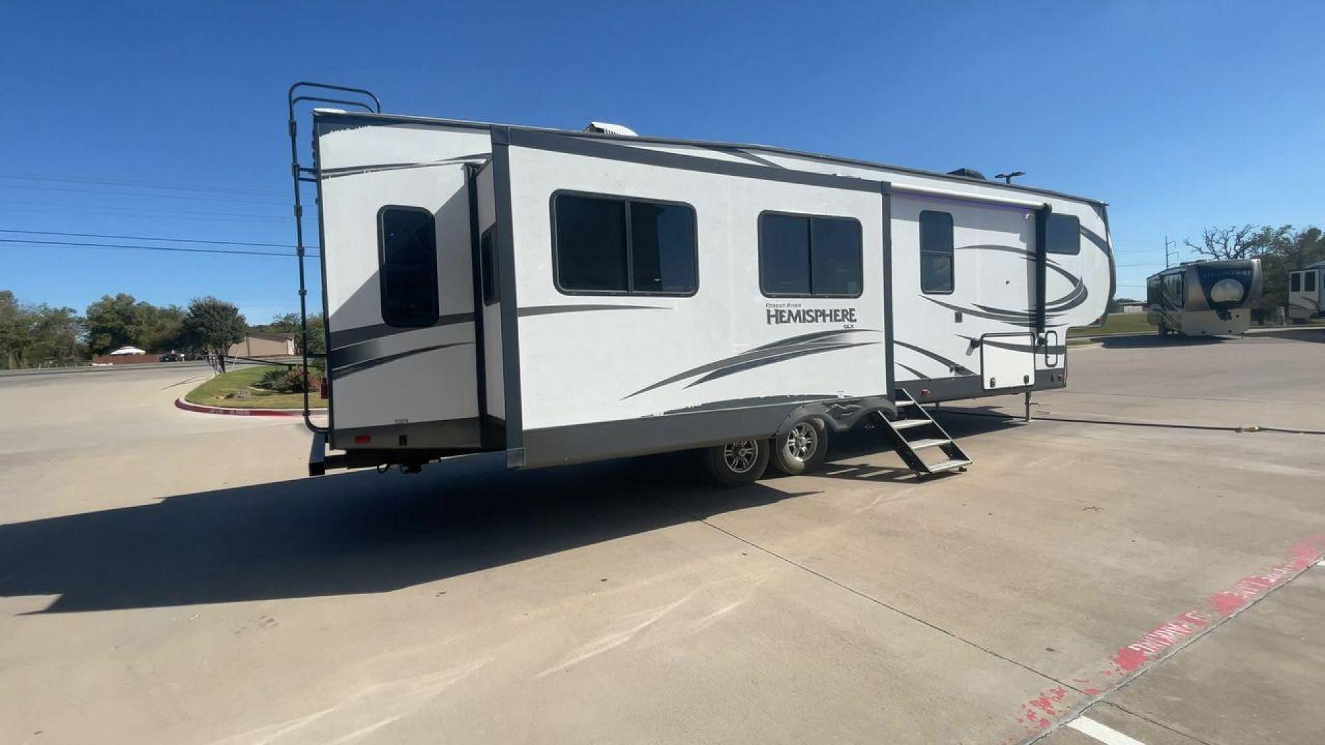 2019 FOREST RIVER HEMISPHERE 337BAR (4X4FSBK25KV) , Length: 38.5 ft. | Dry Weight: 10,264 lbs. | Slides: 3 transmission, located at 4319 N Main St, Cleburne, TX, 76033, (817) 678-5133, 32.385960, -97.391212 - Photo#1