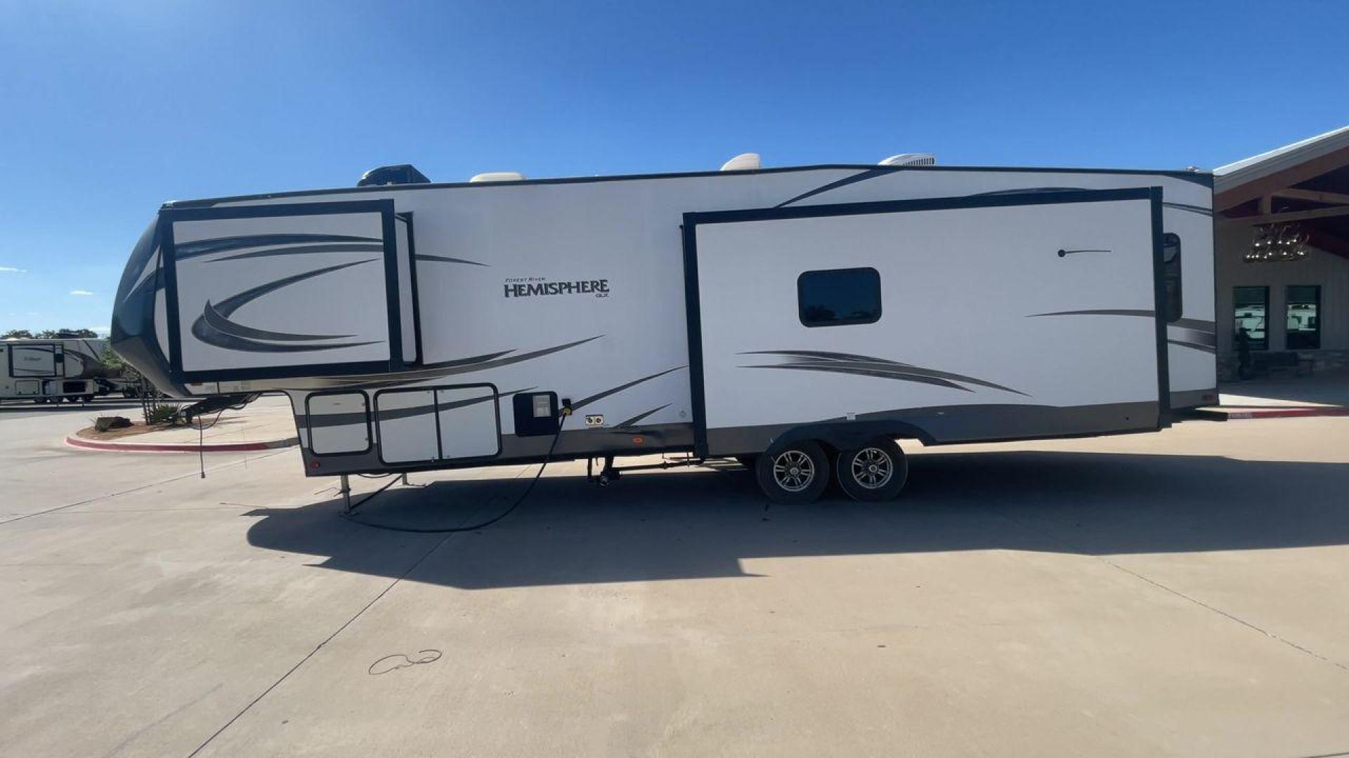 2019 FOREST RIVER HEMISPHERE 337BAR (4X4FSBK25KV) , Length: 38.5 ft. | Dry Weight: 10,264 lbs. | Slides: 3 transmission, located at 4319 N Main St, Cleburne, TX, 76033, (817) 678-5133, 32.385960, -97.391212 - Photo#6