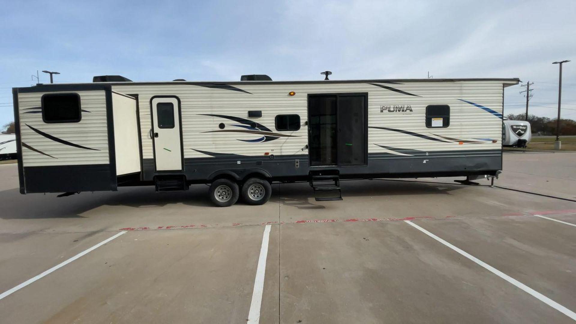 2019 FOREST RIVER PUMA 39PQB (4X4TPUR2XKP) , Length: 42.08 ft. | Dry Weight: 10,709 lbs. | Gross Weight: 13,413 lbs. | Slides: 4 transmission, located at 4319 N Main St, Cleburne, TX, 76033, (817) 678-5133, 32.385960, -97.391212 - Photo#2