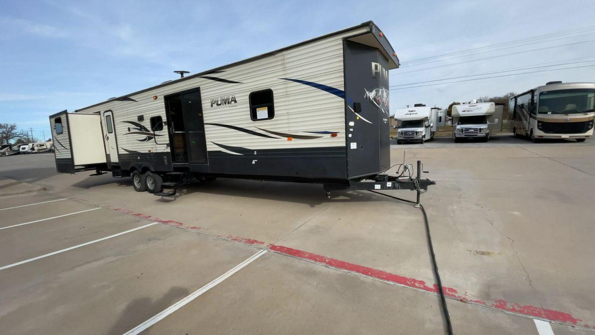 2019 FOREST RIVER PUMA 39PQB (4X4TPUR2XKP) , Length: 42.08 ft. | Dry Weight: 10,709 lbs. | Gross Weight: 13,413 lbs. | Slides: 4 transmission, located at 4319 N Main St, Cleburne, TX, 76033, (817) 678-5133, 32.385960, -97.391212 - Photo#3