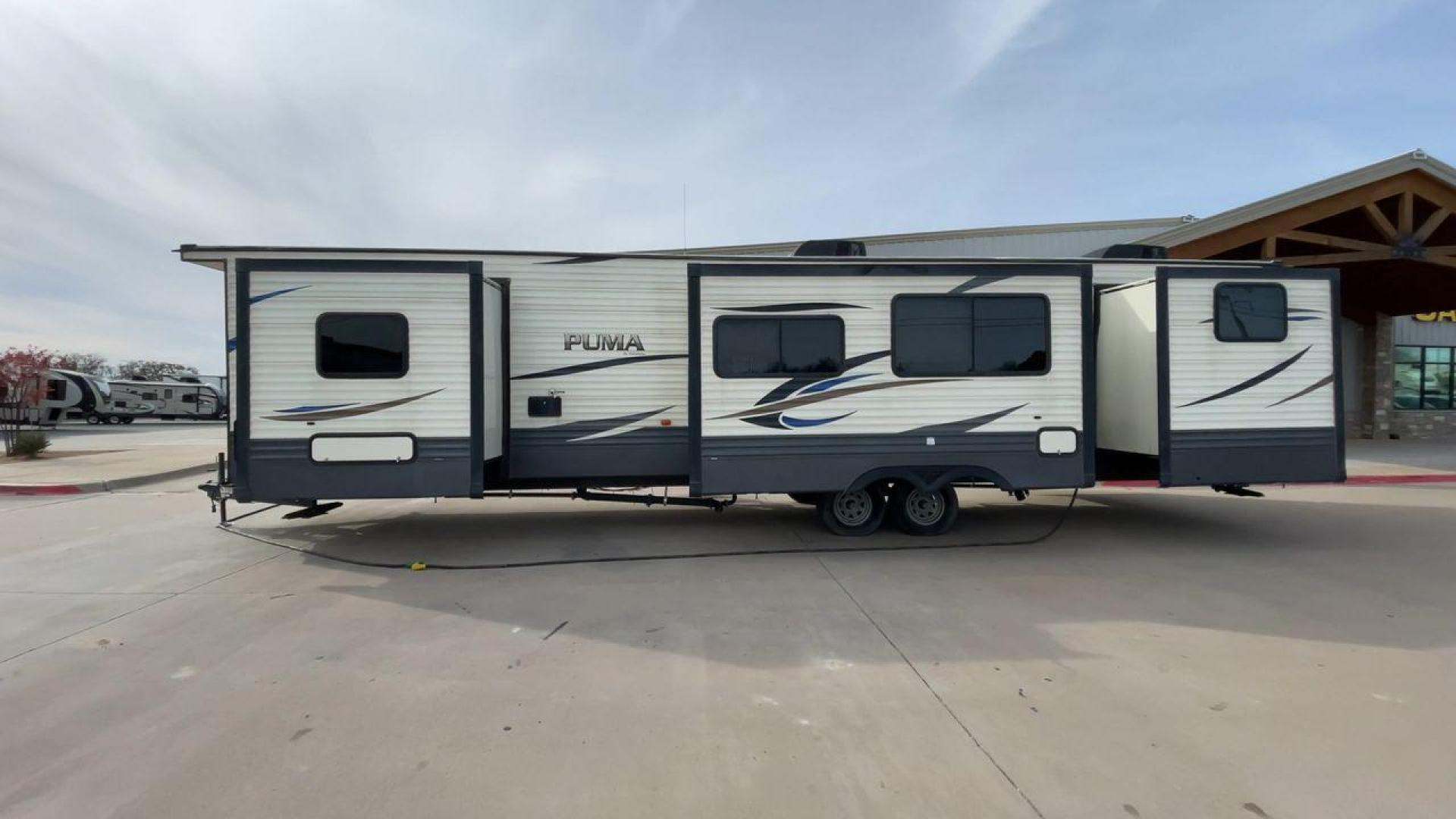 2019 FOREST RIVER PUMA 39PQB (4X4TPUR2XKP) , Length: 42.08 ft. | Dry Weight: 10,709 lbs. | Gross Weight: 13,413 lbs. | Slides: 4 transmission, located at 4319 N Main St, Cleburne, TX, 76033, (817) 678-5133, 32.385960, -97.391212 - Photo#6