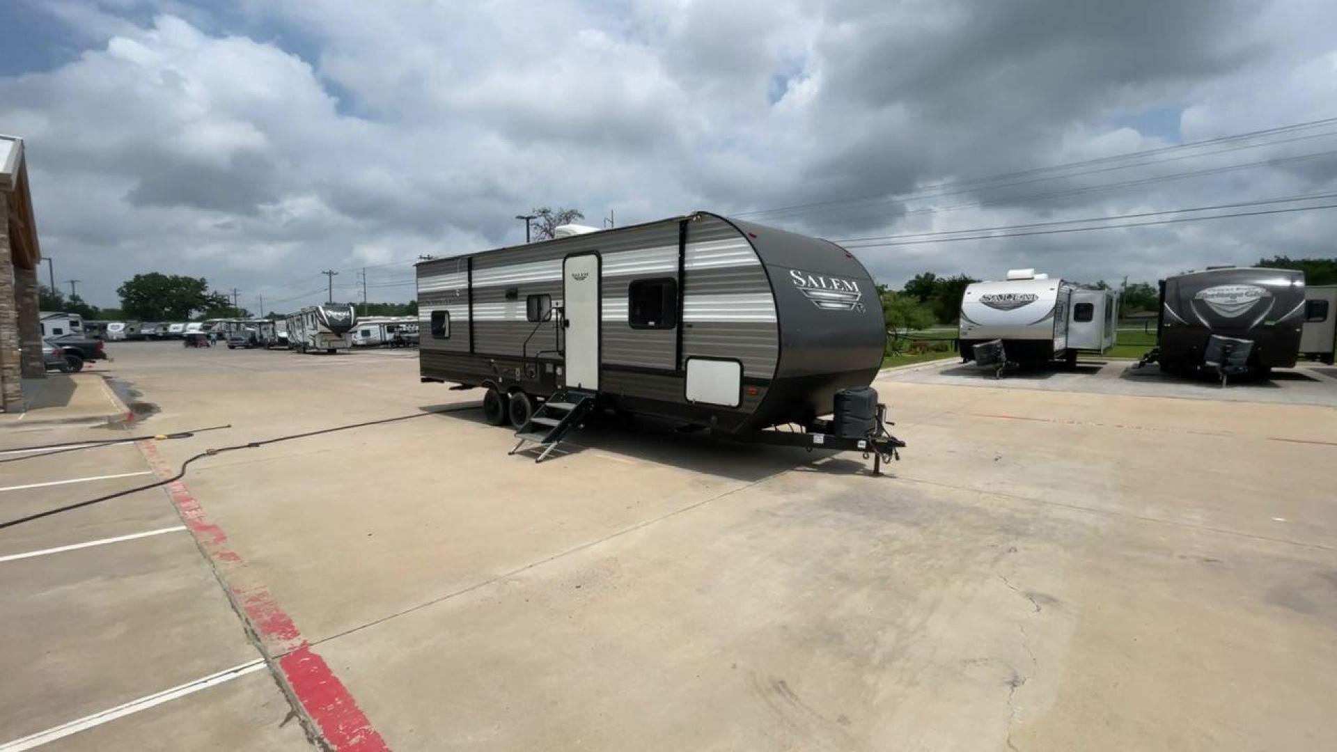 2019 FOREST RIVER SALEM 26DBLE (4X4TSMB23KA) , Slides: 1 transmission, located at 4319 N Main St, Cleburne, TX, 76033, (817) 678-5133, 32.385960, -97.391212 - This 2019 Forest River Salem 26DBLE is a single-slide travel trailer that offers sleeping space for up to 10 people! This Salem is designed with a straightforward and convenient floorplan featuring a front bedroom, central living and kitchen, and rear bunk and bath. The front bedroom can accommod - Photo#3