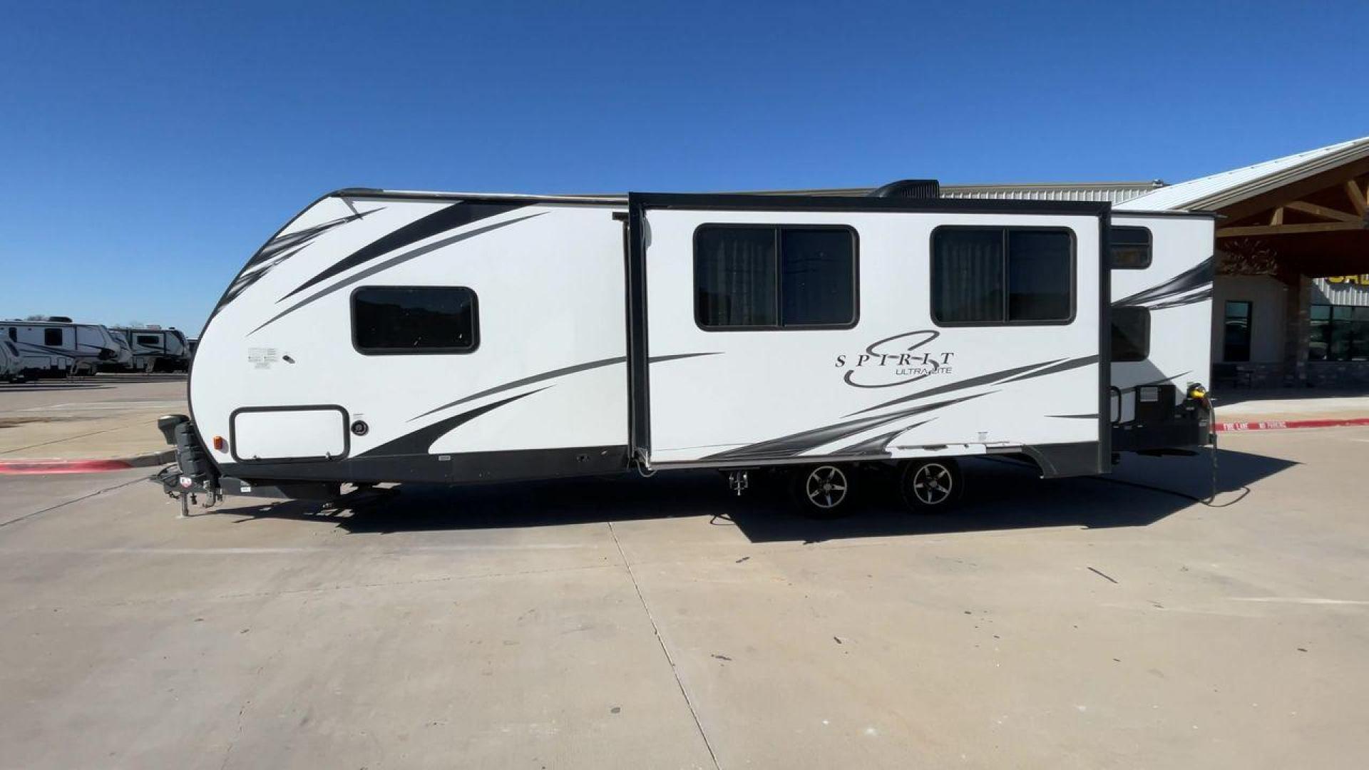 2019 FOREST RIVER SPIRIT 2963BH (5ZT2SBVB9KS) , Length: 33.92 ft. | Dry Weight: 6,408 lbs. | Slides: 1 transmission, located at 4319 N Main St, Cleburne, TX, 76033, (817) 678-5133, 32.385960, -97.391212 - This 2019 Forest River Spirit 2963BH is a dual-axle aluminum wheel setup measuring just under 34 feet long. It has a dry weight of 6,408 lbs. and a payload capacity of 1,192 lbs. It also has a manageable hitch weight of 760 lbs. It features two doors and one slide. This travel trailer offers sleepin - Photo#6