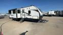 2019 WHITE FOREST RIVER WILDCAT 343BIK (5ZT2WCZB1KB) , Length: 37.42 ft. | Dry Weight: 8,226 lbs. | Slides: 3 transmission, located at 4319 N Main St, Cleburne, TX, 76033, (817) 678-5133, 32.385960, -97.391212 - The 2019 Forest River Wildcat 343BIK is a triple slide travel trailer that measures 37.42 ft. in length. It has a dry weight of 8,226 lbs. and a payload capacity of 3,002 lbs. It is made of aluminum and fiberglass. It comes with automatic heating and cooling rated at 30,000 and 15,000 BTUs respectiv - Photo#3