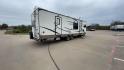 2019 FOREST RIVER WINDJAMMER 3008V (4X4TRLF24K1) , Length: 34 ft | Dry Weight: 7,433 lbs | Slides: 2 transmission, located at 4319 N Main St, Cleburne, TX, 76033, (817) 678-5133, 32.385960, -97.391212 - Measuring 34 ft long, the 2019 Forest River Windjammer 3008V travel trailer is sleek and modern. The body features a white fiberglass surface accented with brown and black decals that provide a stylish and aerodynamic look. The front of the trailer is distinct with its pointed V-nose design. This en - Photo#1