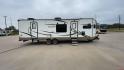 2019 FOREST RIVER WINDJAMMER 3008V (4X4TRLF24K1) , Length: 34 ft | Dry Weight: 7,433 lbs | Slides: 2 transmission, located at 4319 N Main St, Cleburne, TX, 76033, (817) 678-5133, 32.385960, -97.391212 - Measuring 34 ft long, the 2019 Forest River Windjammer 3008V travel trailer is sleek and modern. The body features a white fiberglass surface accented with brown and black decals that provide a stylish and aerodynamic look. The front of the trailer is distinct with its pointed V-nose design. This en - Photo#2