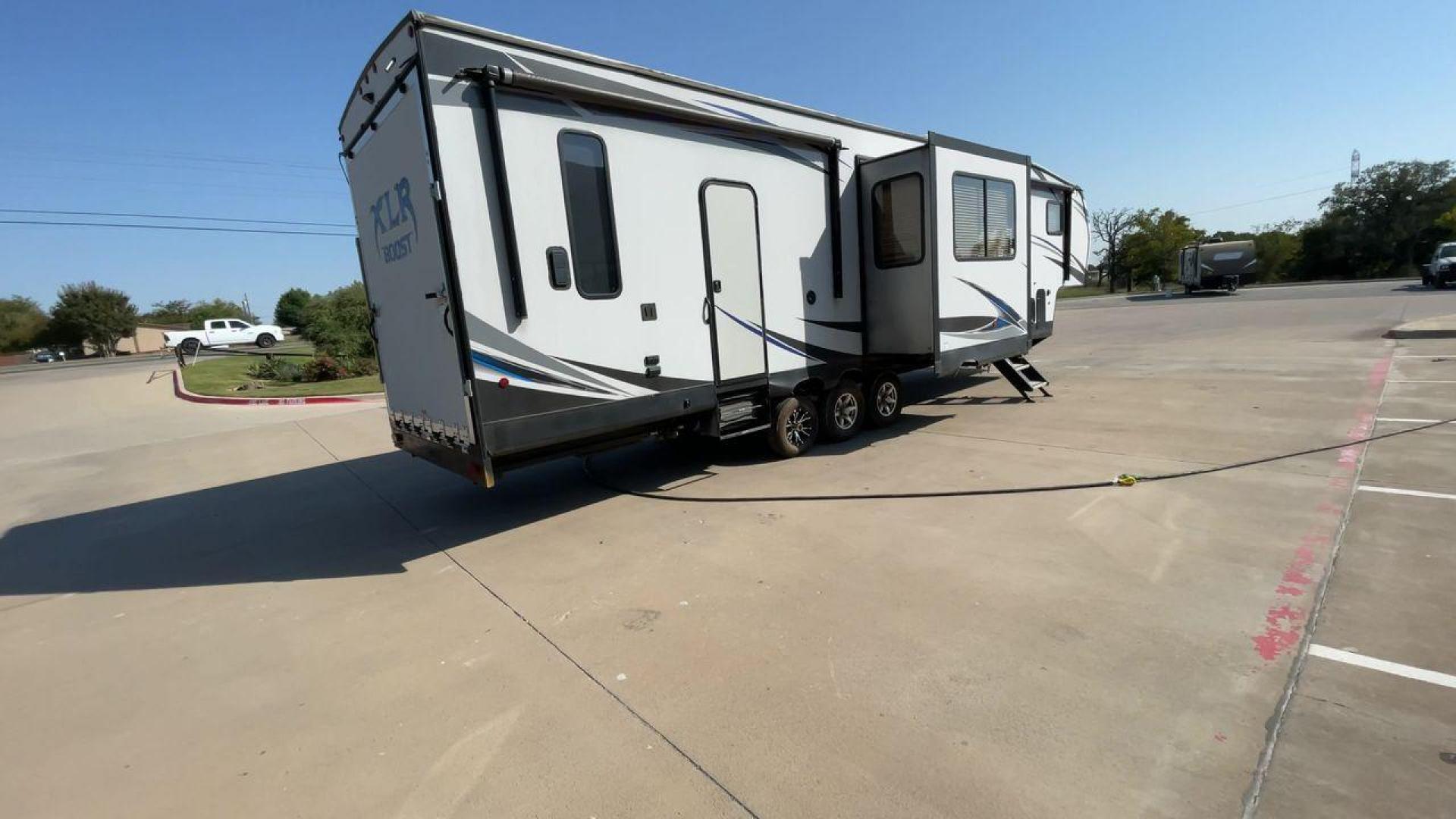 2019 FOREST RIVER XLR BOOST 37TSX13 (5ZT3XL2F9K1) , Length: 39.75 ft. | Dry Weight: 12,687 lbs. | Slides: 3 transmission, located at 4319 N Main St, Cleburne, TX, 76033, (817) 678-5133, 32.385960, -97.391212 - Photo#1