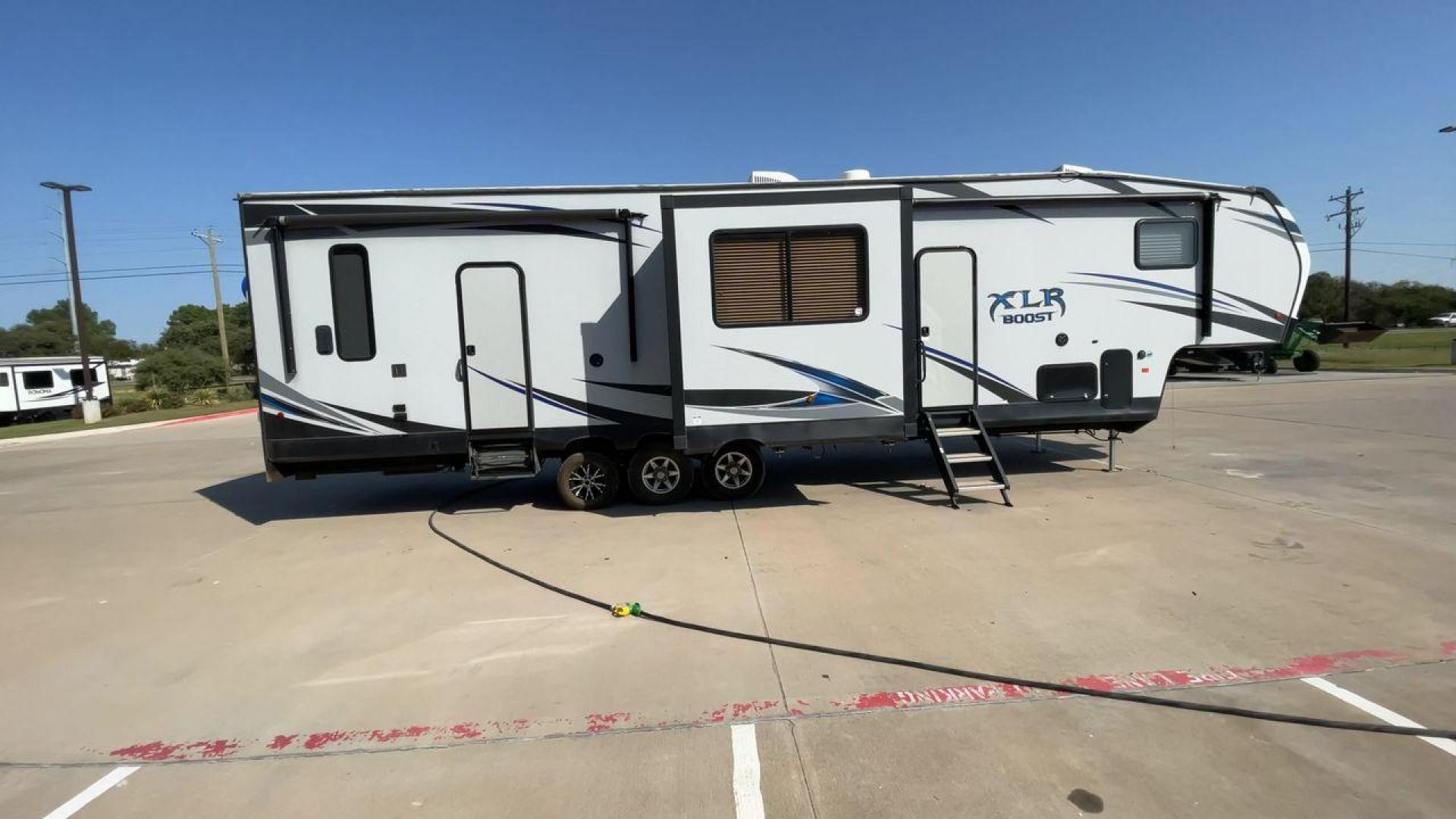 2019 FOREST RIVER XLR BOOST 37TSX13 (5ZT3XL2F9K1) , Length: 39.75 ft. | Dry Weight: 12,687 lbs. | Slides: 3 transmission, located at 4319 N Main St, Cleburne, TX, 76033, (817) 678-5133, 32.385960, -97.391212 - Photo#2