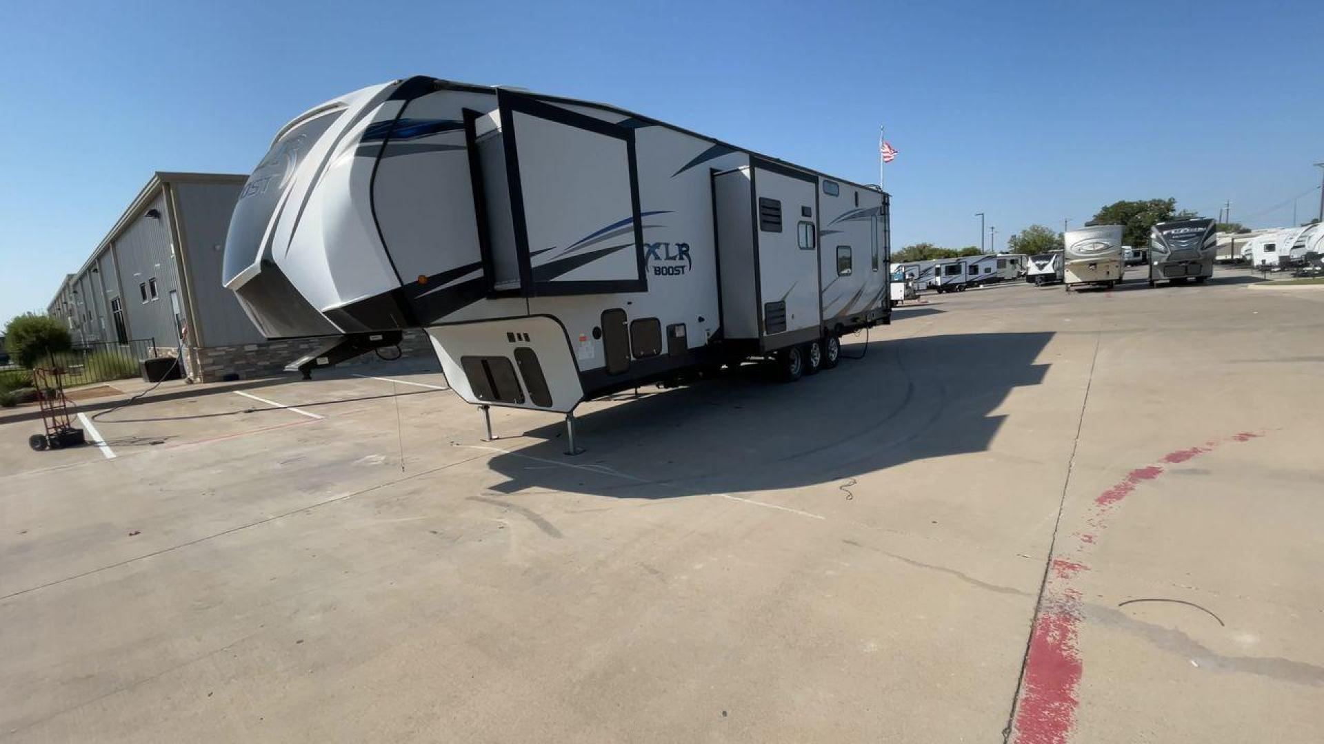 2019 FOREST RIVER XLR BOOST 37TSX13 (5ZT3XL2F9K1) , Length: 39.75 ft. | Dry Weight: 12,687 lbs. | Slides: 3 transmission, located at 4319 N Main St, Cleburne, TX, 76033, (817) 678-5133, 32.385960, -97.391212 - Photo#5