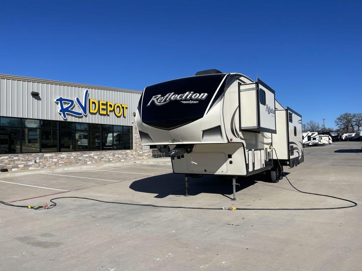 2019 GRAND DESIGN REFLECTION 303RLS (573FR3329K3) , Length: 32.42 ft| Dry Weight: 9,265 lbs. | Gross Weight: 11,995 lbs. | Slides: 3 transmission, located at 4319 N Main St, Cleburne, TX, 76033, (817) 678-5133, 32.385960, -97.391212 - Experience the pinnacle of opulence and elegance with the 2019 Grand Design Reflection 303RLS, a fifth-wheel trailer that sets new benchmarks for luxurious RV living. This model boasts a generous 33-foot length, offering a roomy and thoughtfully crafted interior that creates the perfect atmosphere f - Photo#0