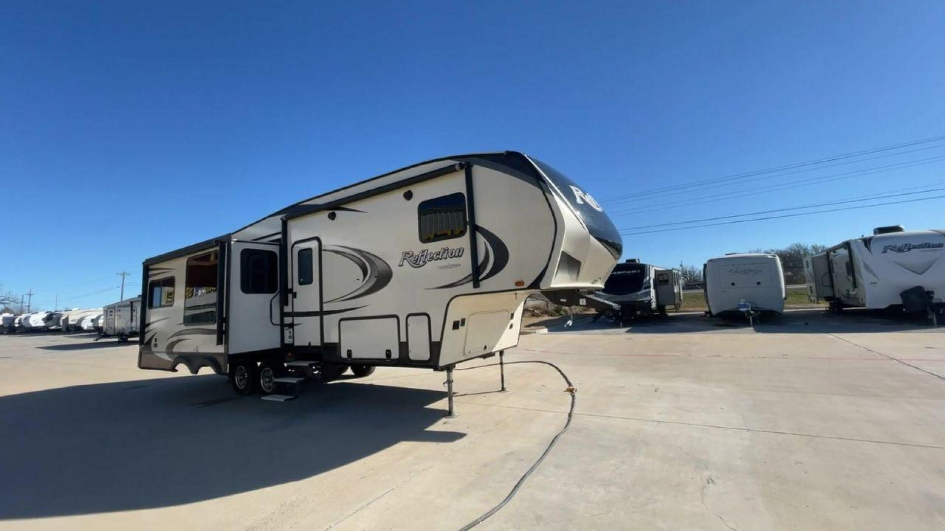 2019 GRAND DESIGN REFLECTION 303RLS (573FR3329K3) , Length: 32.42 ft| Dry Weight: 9,265 lbs. | Gross Weight: 11,995 lbs. | Slides: 3 transmission, located at 4319 N Main St, Cleburne, TX, 76033, (817) 678-5133, 32.385960, -97.391212 - Experience the pinnacle of opulence and elegance with the 2019 Grand Design Reflection 303RLS, a fifth-wheel trailer that sets new benchmarks for luxurious RV living. This model boasts a generous 33-foot length, offering a roomy and thoughtfully crafted interior that creates the perfect atmosphere f - Photo#3