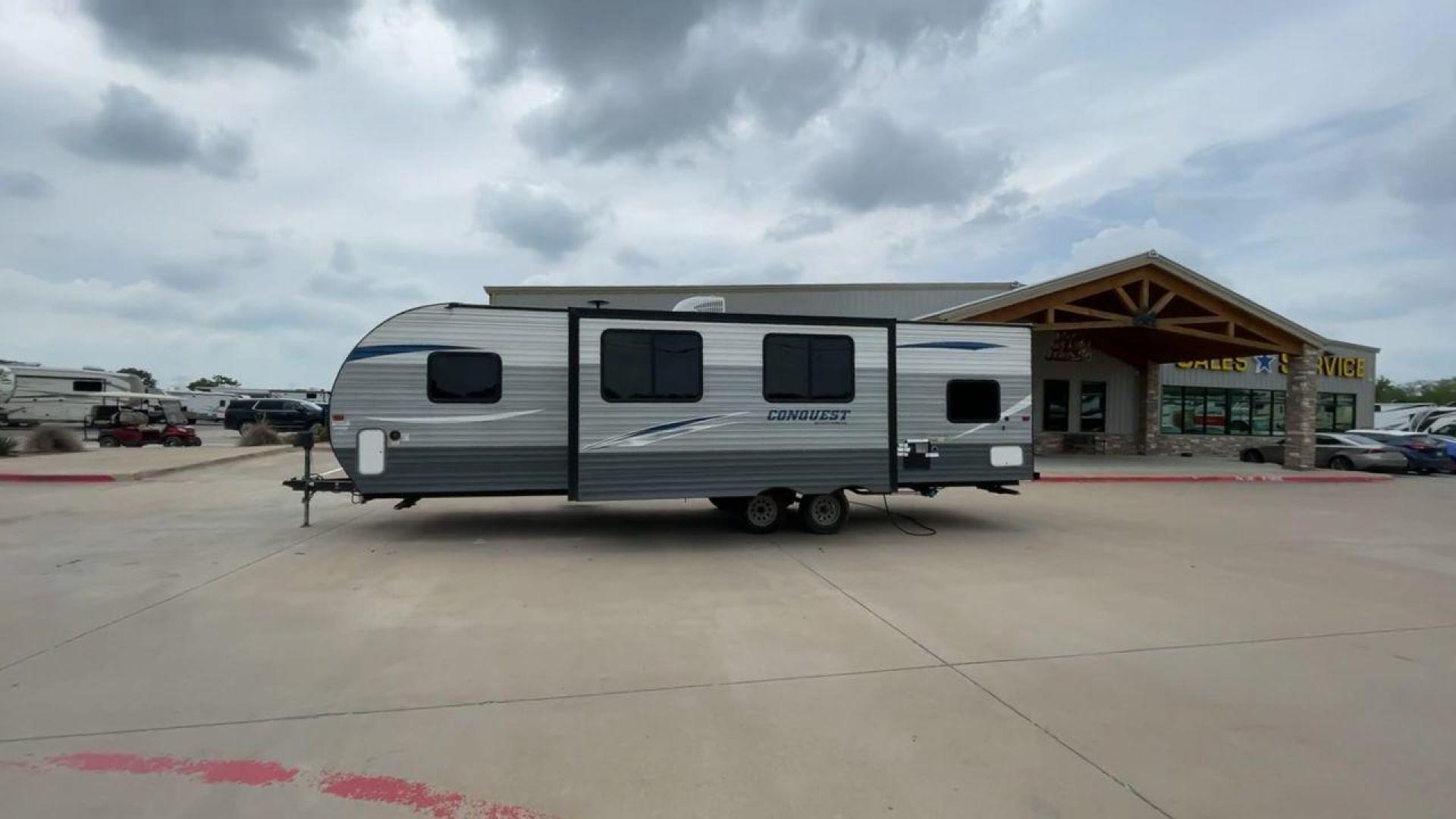 2019 GULF STREAM CONQUEST 274QB (1NL1G3226K1) , Length: 32.25 ft. | Dry Weight: 6,230 lbs. | Slides: 1 transmission, located at 4319 N Main St, Cleburne, TX, 76033, (817) 678-5133, 32.385960, -97.391212 - The 2019 Gulf Stream 274QB is a dual-axle steel-wheel set-up that measures 32.25 ft. in length. It has a dry weight of 6,230 lbs. and a payload capacity of 1,918 lbs. It has automatic heating and cooling rated at 16,000 and 13,500 BTUs, respectively. It is also equipped with one power slide and a po - Photo#6