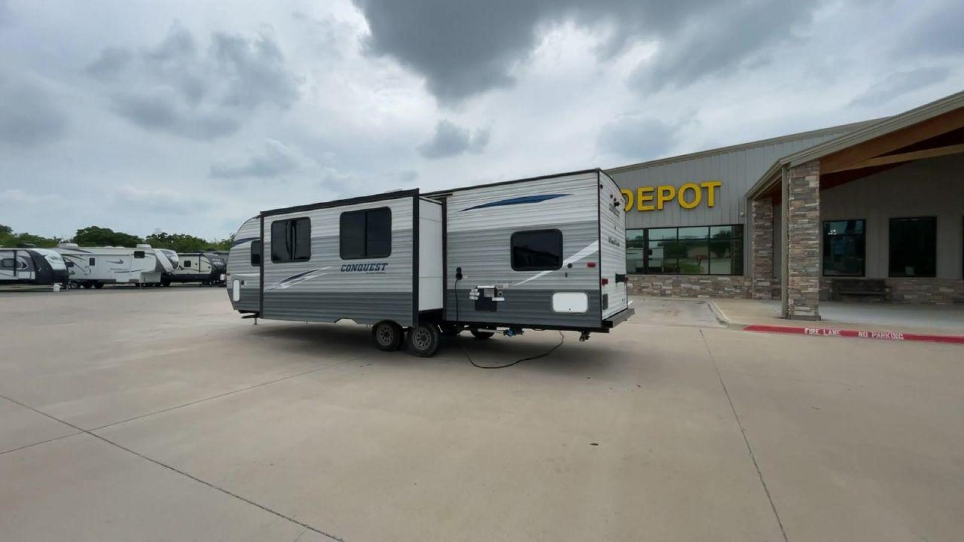 2019 GULF STREAM CONQUEST 274QB (1NL1G3226K1) , Length: 32.25 ft. | Dry Weight: 6,230 lbs. | Slides: 1 transmission, located at 4319 N Main St, Cleburne, TX, 76033, (817) 678-5133, 32.385960, -97.391212 - The 2019 Gulf Stream 274QB is a dual-axle steel-wheel set-up that measures 32.25 ft. in length. It has a dry weight of 6,230 lbs. and a payload capacity of 1,918 lbs. It has automatic heating and cooling rated at 16,000 and 13,500 BTUs, respectively. It is also equipped with one power slide and a po - Photo#7