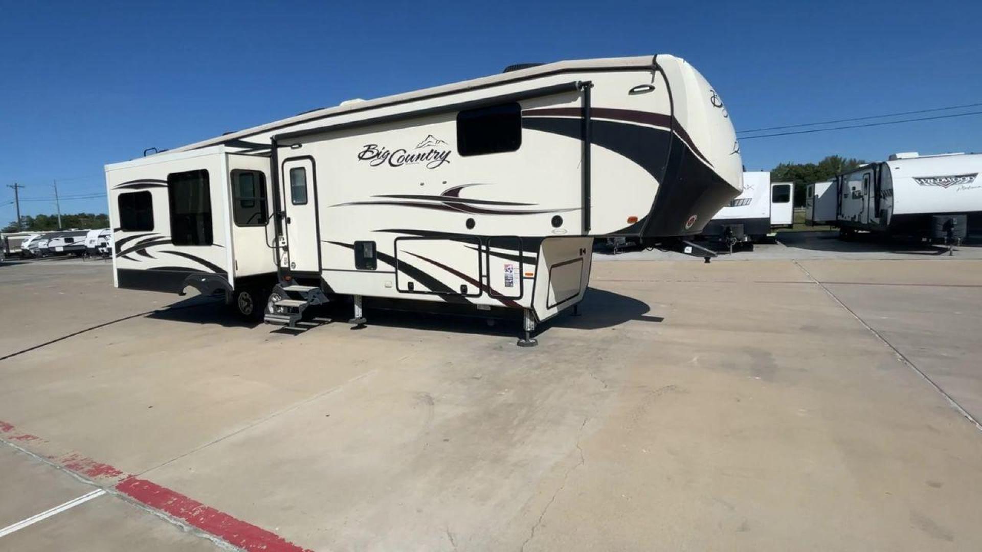 2019 TAN HEARTLAND BIG COUNTRY 3560SS (5SFBG4120KE) , Length: 40.58 ft. | Dry Weight: 13,420 lbs. | Gross Weight: 16,000 lbs. | Slides: 3 transmission, located at 4319 N Main St, Cleburne, TX, 76033, (817) 678-5133, 32.385960, -97.391212 - Photo#3