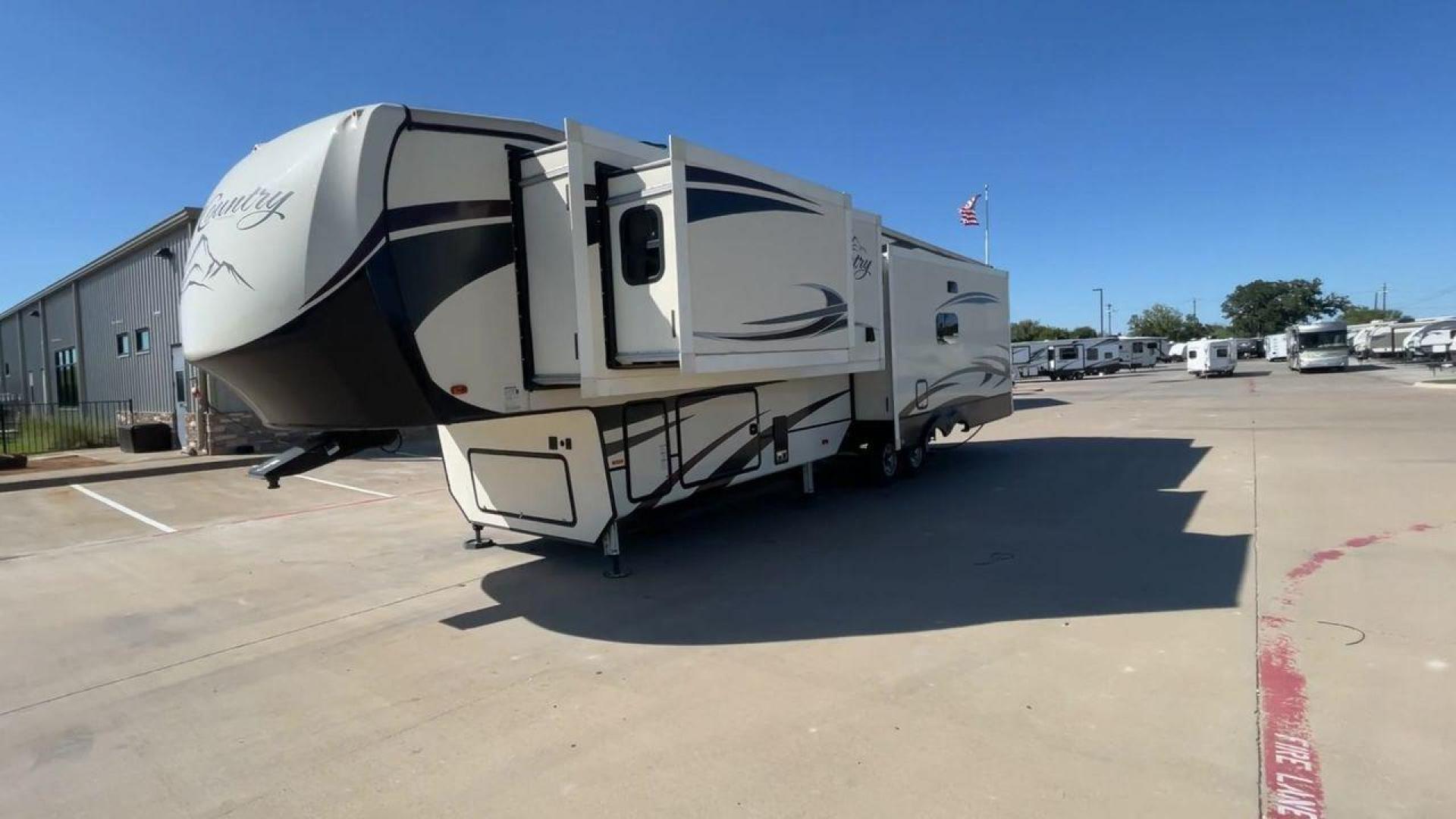 2019 TAN HEARTLAND BIG COUNTRY 3560SS (5SFBG4120KE) , Length: 40.58 ft. | Dry Weight: 13,420 lbs. | Gross Weight: 16,000 lbs. | Slides: 3 transmission, located at 4319 N Main St, Cleburne, TX, 76033, (817) 678-5133, 32.385960, -97.391212 - Photo#5