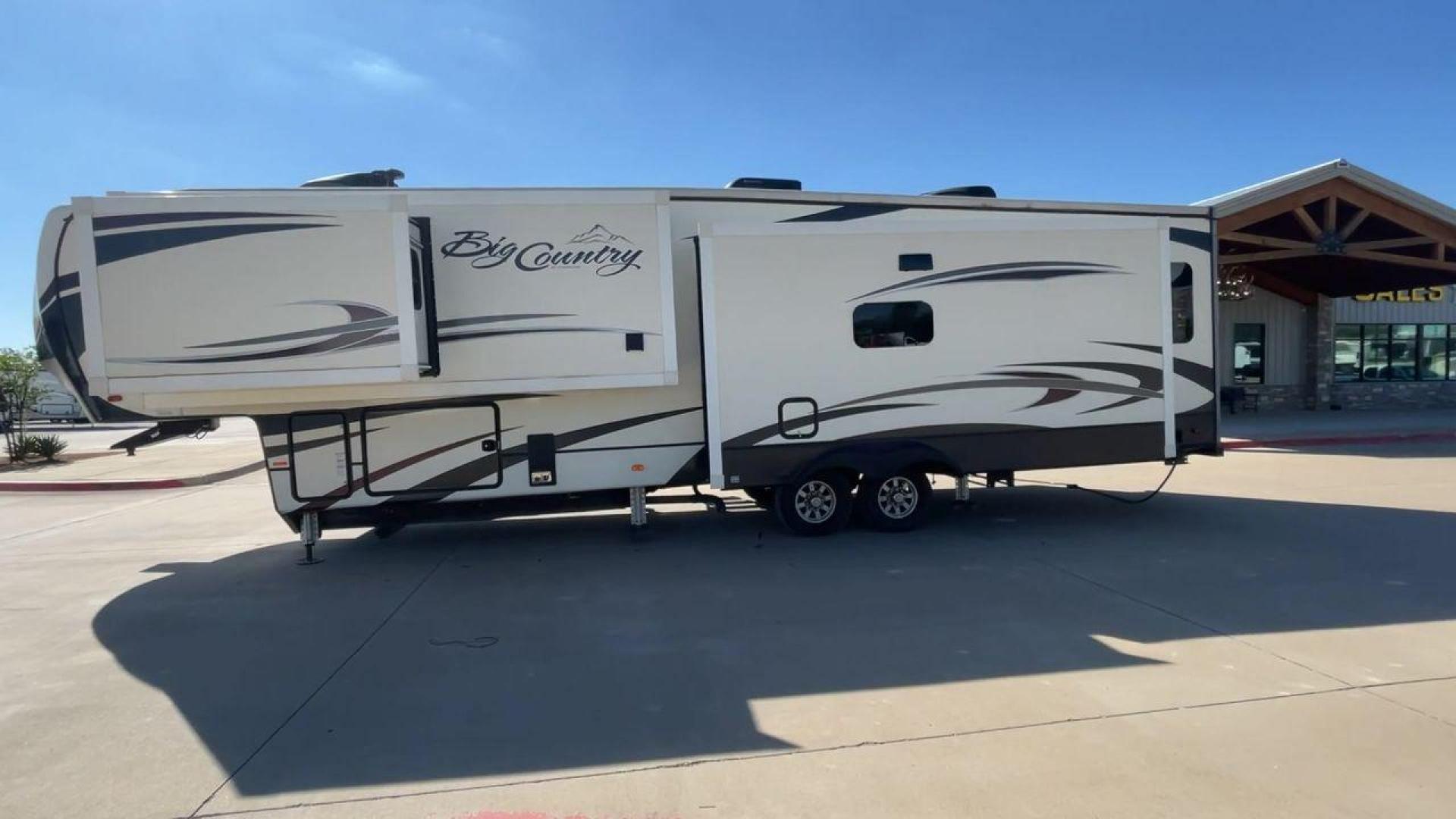 2019 TAN HEARTLAND BIG COUNTRY 3560SS (5SFBG4120KE) , Length: 40.58 ft. | Dry Weight: 13,420 lbs. | Gross Weight: 16,000 lbs. | Slides: 3 transmission, located at 4319 N Main St, Cleburne, TX, 76033, (817) 678-5133, 32.385960, -97.391212 - Photo#6