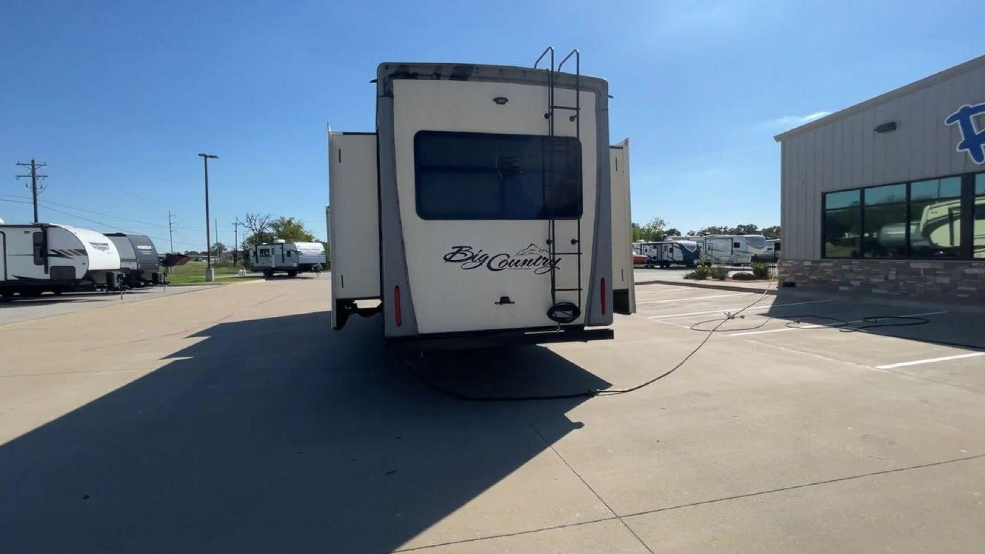 2019 TAN HEARTLAND BIG COUNTRY 3560SS (5SFBG4120KE) , Length: 40.58 ft. | Dry Weight: 13,420 lbs. | Gross Weight: 16,000 lbs. | Slides: 3 transmission, located at 4319 N Main St, Cleburne, TX, 76033, (817) 678-5133, 32.385960, -97.391212 - Photo#8