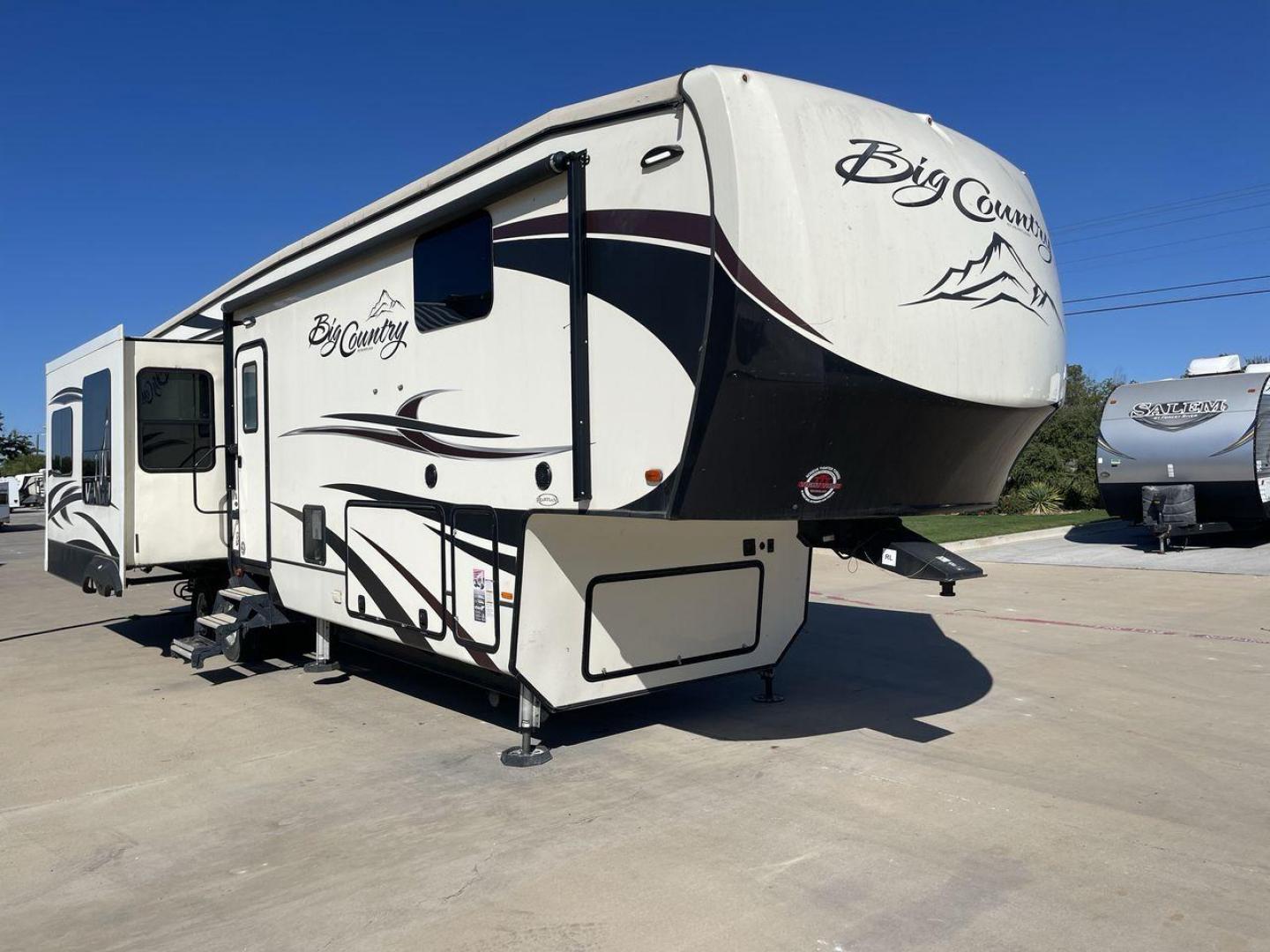 2019 TAN HEARTLAND BIG COUNTRY 3560SS (5SFBG4120KE) , Length: 40.58 ft. | Dry Weight: 13,420 lbs. | Gross Weight: 16,000 lbs. | Slides: 3 transmission, located at 4319 N Main St, Cleburne, TX, 76033, (817) 678-5133, 32.385960, -97.391212 - Photo#22