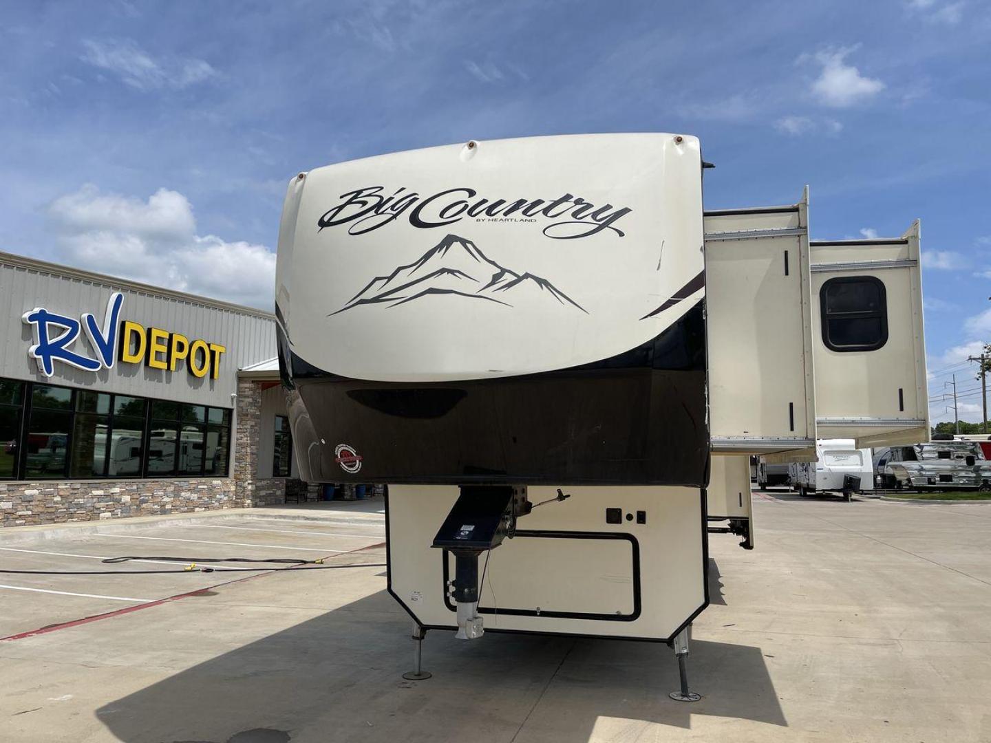 2019 HEARTLAND BIG COUNTRY 3560SS (5SFBG4125KE) , Length: 40.58 ft. | Dry Weight: 13,420 lbs. | Gross Weight: 16,000 lbs. | Slides: 3 transmission, located at 4319 N Main St, Cleburne, TX, 76033, (817) 678-5133, 32.385960, -97.391212 - Here are several reasons to buy this RV: (1) It features a spacious rear living area with large windows offering stunning panoramic views. (2) The master suite is also located in the rear, creating a secluded oasis away from the main living area. (3) It has well-equipped kitchen boasts a conve - Photo#0