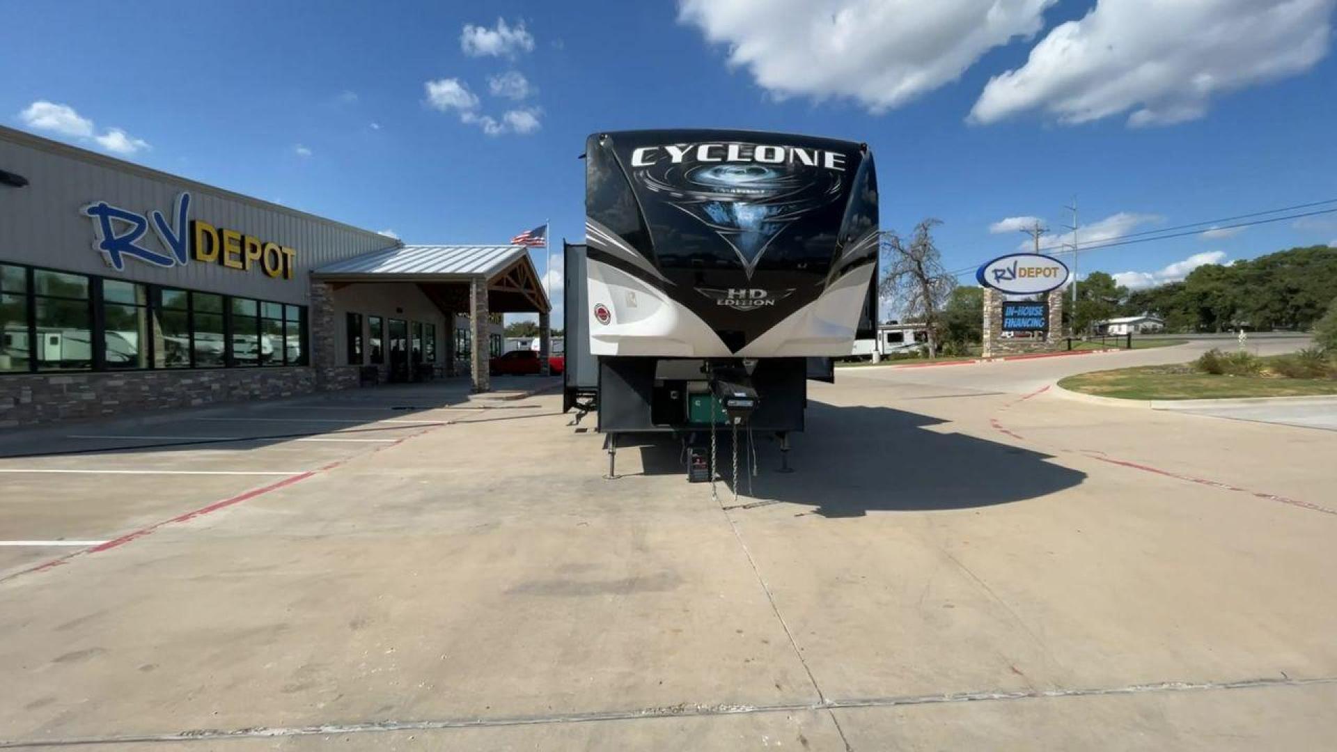 2019 HEARTLAND CYCLONE 3611 (5SFCG3923KE) , Length: 38.8 ft. | Dry Weight: 15,305 lbs. | Gross Weight: 17,000 lbs. | Slides: 3 transmission, located at 4319 N Main St, Cleburne, TX, 76033, (817) 678-5133, 32.385960, -97.391212 - The 2019 Heartland Cyclone 3611 is a high-end toy hauler that combines comfort, versatility, and style, ideal for adventurous families or couples who love to travel with their toys. It measures 38.8 feet in length, making it a spacious option for extended stays or full-time living. It boasts a dry w - Photo#4