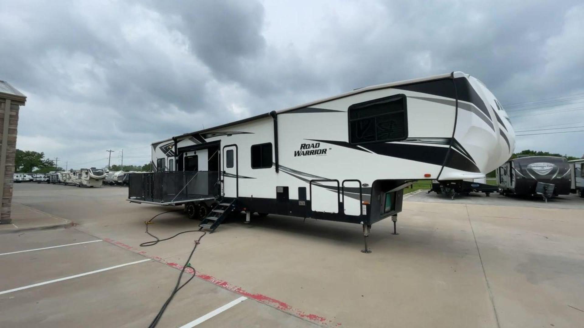 2019 HEARTLAND ROAD WARRIOR 427RW (5SFCG4435KE) , Length: 44.08 ft. | Dry Weight: 16,400 lbs. | Gross Weight: 20,000 lbs. | Slides: 2 transmission, located at 4319 N Main St, Cleburne, TX, 76033, (817) 678-5133, 32.385960, -97.391212 - The 2019 Heartland Road Warrior 427RW fifth wheel toy hauler is ready for your next journey. The length of this amazing RV is 44.08 feet, its dry weight is 16,400 lbs and its gross weight is 20,000 lbs. This makes it stable and long-lasting on the road. This RV is strong and stylish, with two slides - Photo#3