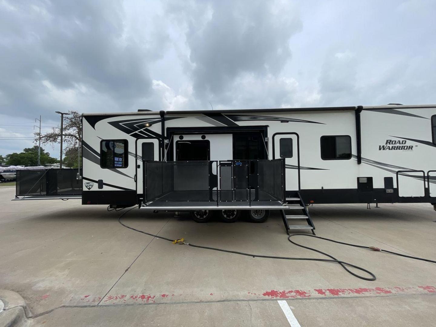 2019 HEARTLAND ROAD WARRIOR 427RW (5SFCG4435KE) , Length: 44.08 ft. | Dry Weight: 16,400 lbs. | Gross Weight: 20,000 lbs. | Slides: 2 transmission, located at 4319 N Main St, Cleburne, TX, 76033, (817) 678-5133, 32.385960, -97.391212 - The 2019 Heartland Road Warrior 427RW fifth wheel toy hauler is ready for your next journey. The length of this amazing RV is 44.08 feet, its dry weight is 16,400 lbs and its gross weight is 20,000 lbs. This makes it stable and long-lasting on the road. This RV is strong and stylish, with two slides - Photo#24